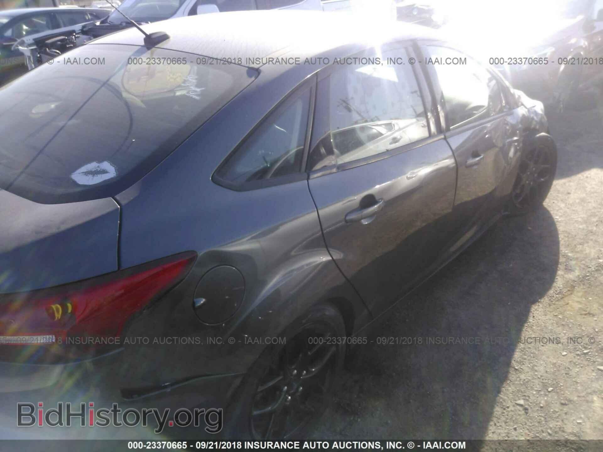 2016 Ford Focus - VIN: 1FADP3F24GL230663 - Фото 4