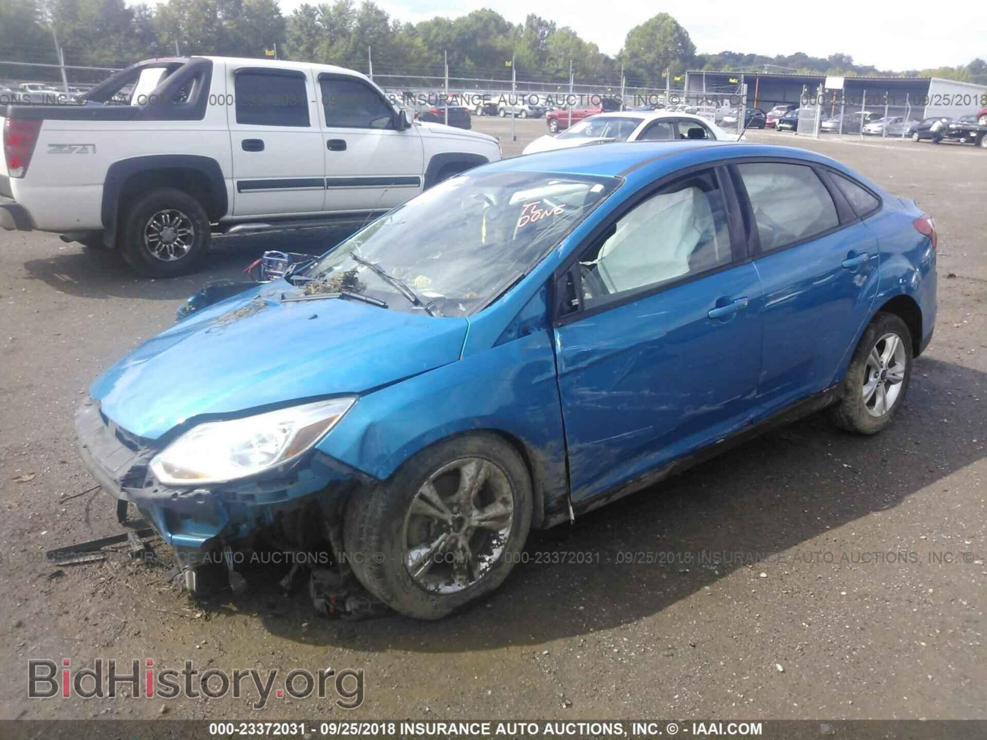 2014 Ford Focus - VIN: 1FADP3F22EL229010 - Фото 2
