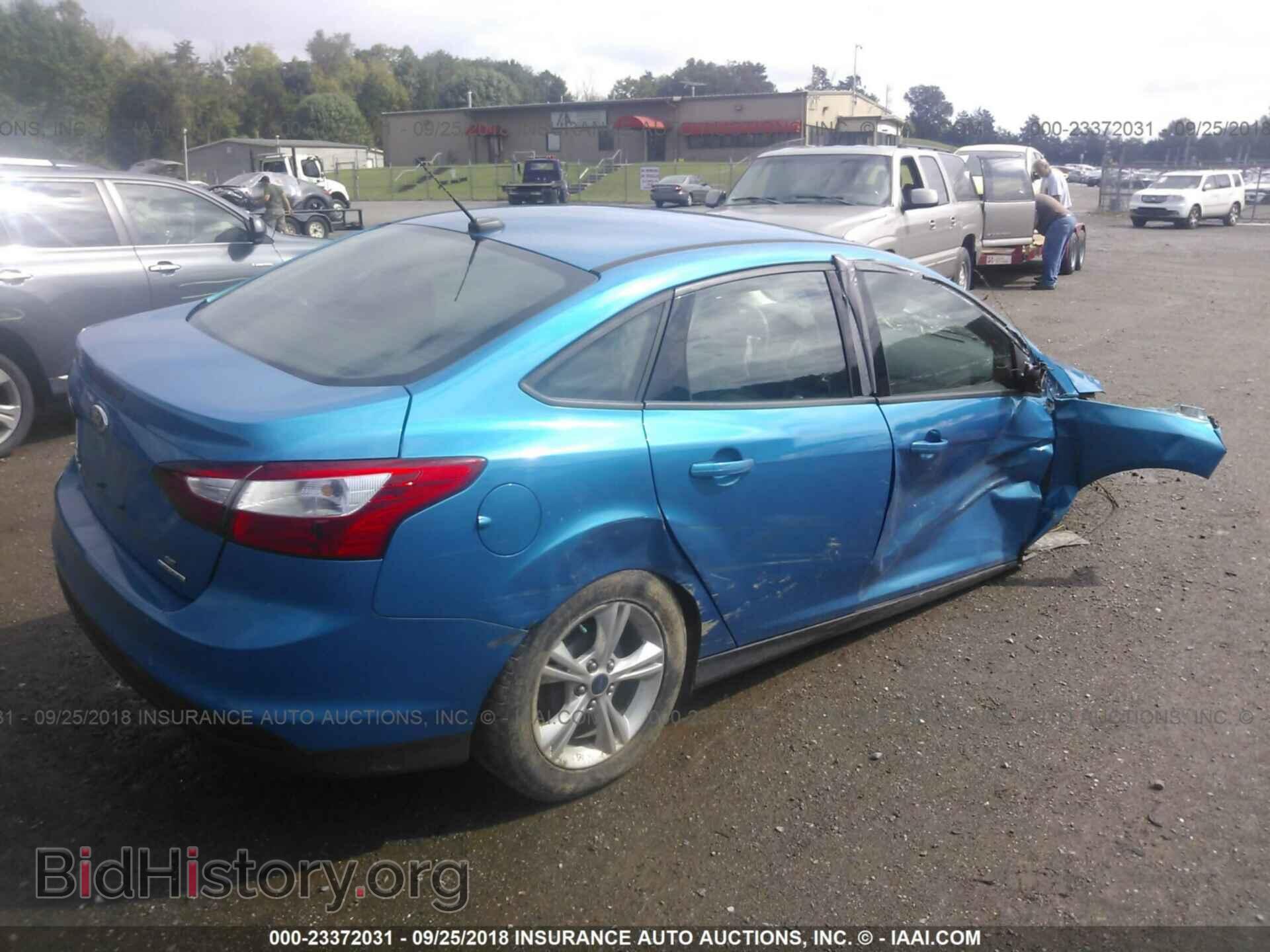 2014 Ford Focus - VIN: 1FADP3F22EL229010 - Фото 4