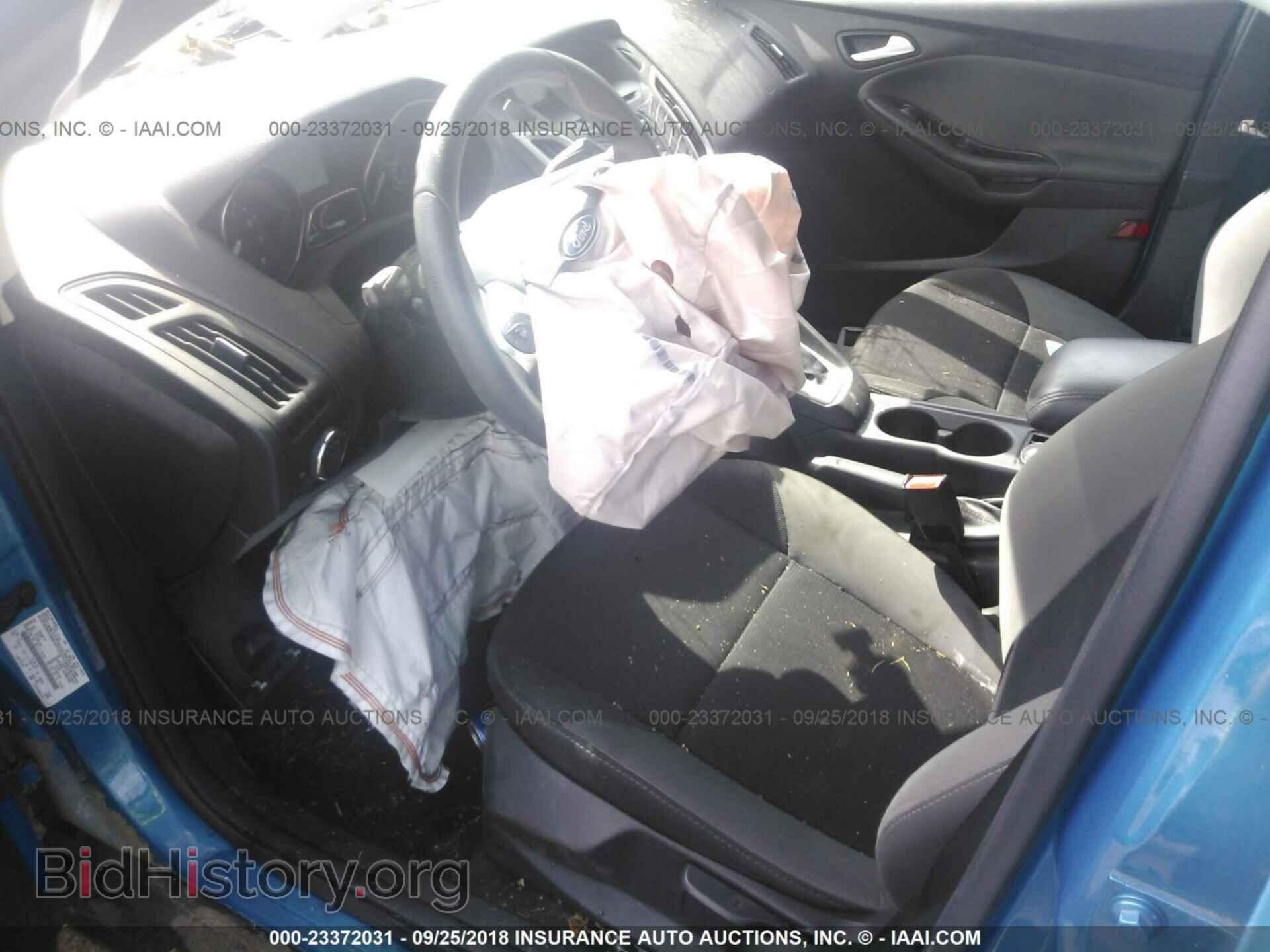 2014 Ford Focus - VIN: 1FADP3F22EL229010 - Фото 5