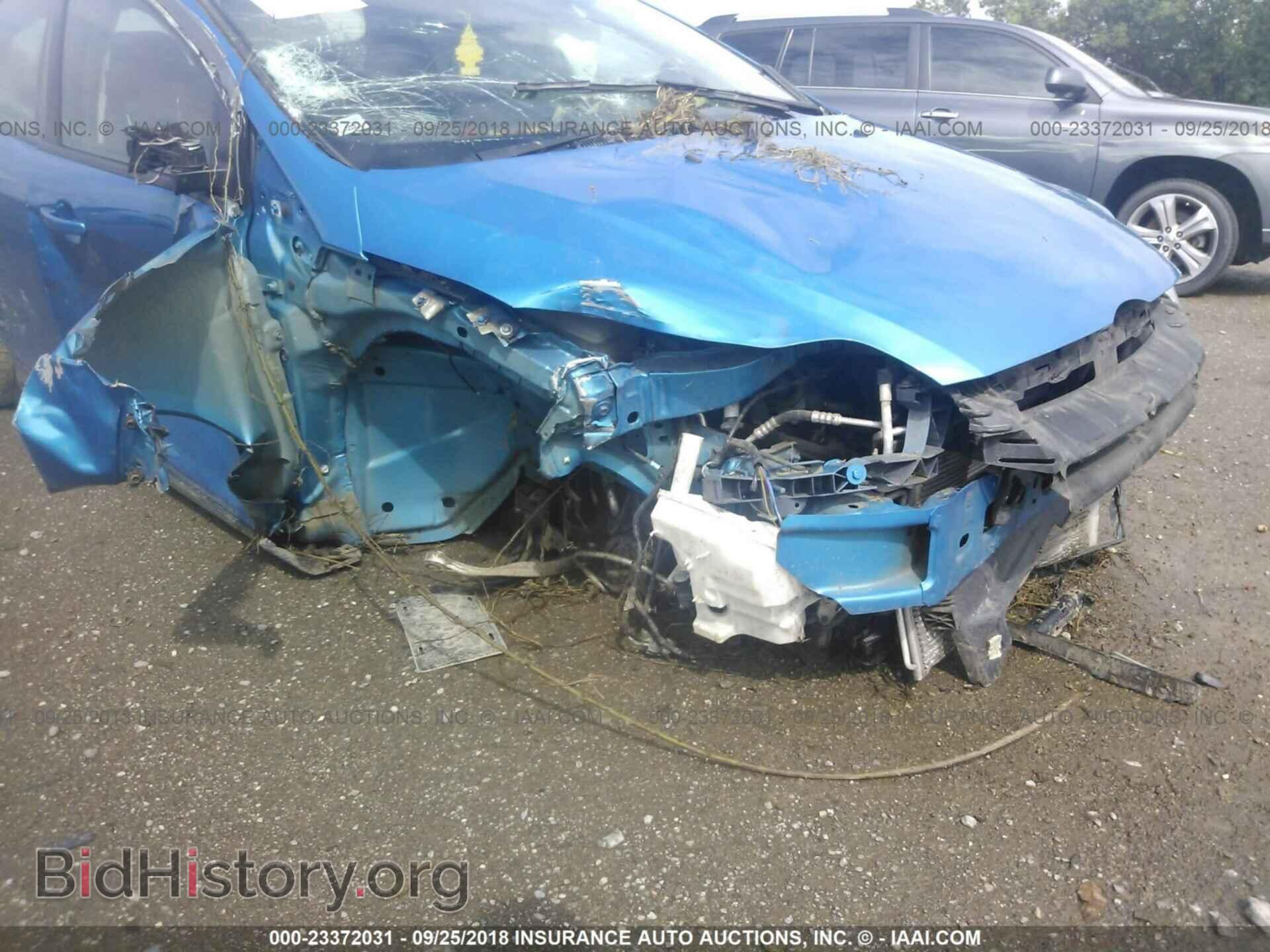 2014 Ford Focus - VIN: 1FADP3F22EL229010 - Фото 6
