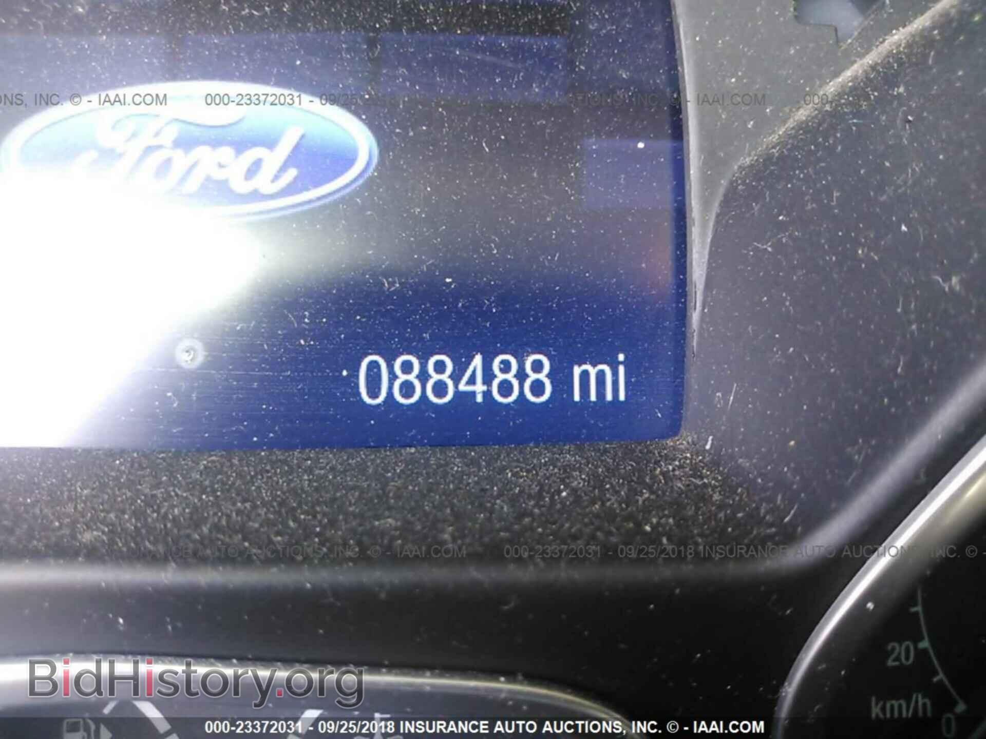2014 Ford Focus - VIN: 1FADP3F22EL229010 - Фото 7