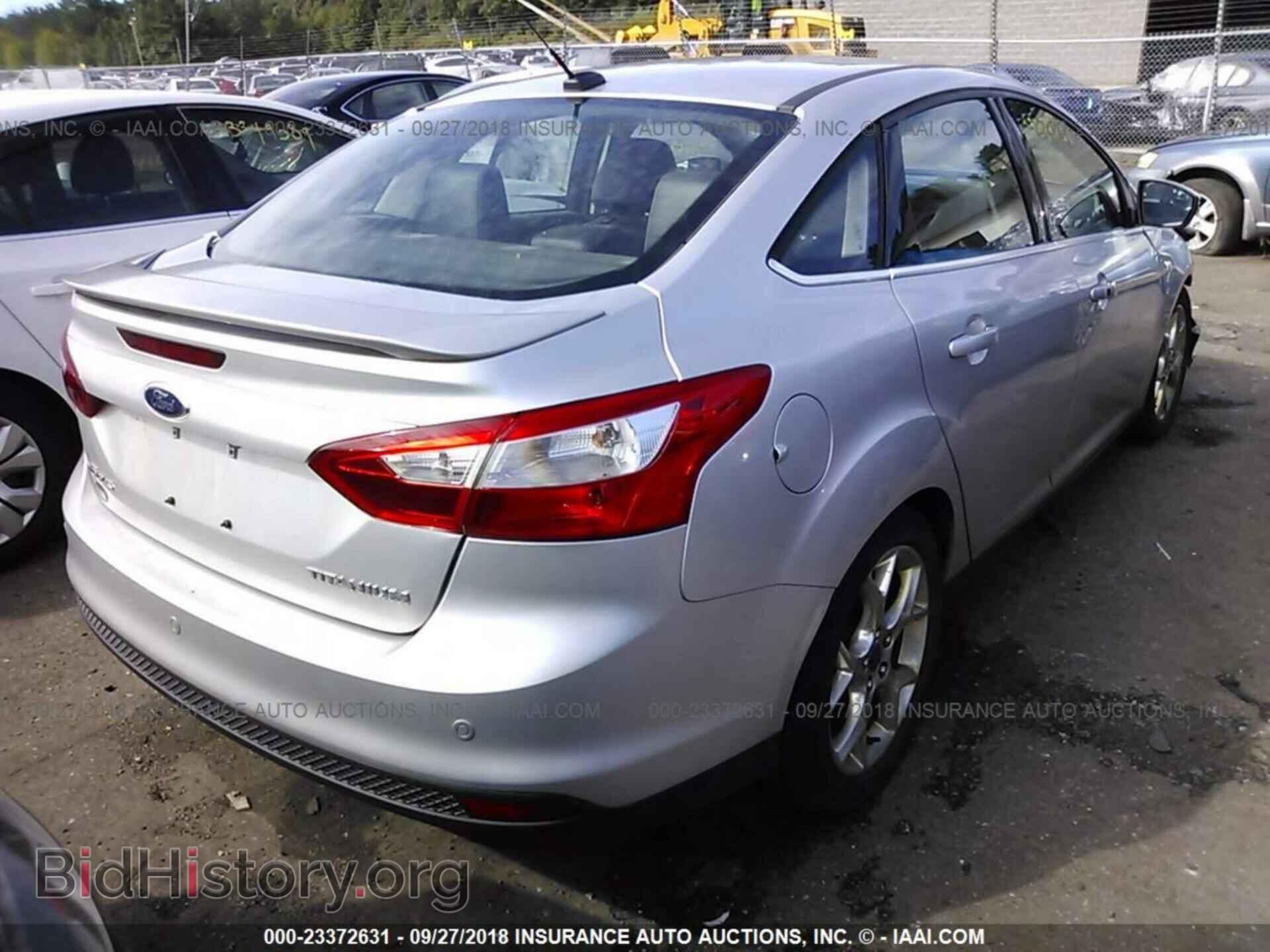 2014 Ford Focus - VIN: 1FADP3J27EL134191 - Фото 4
