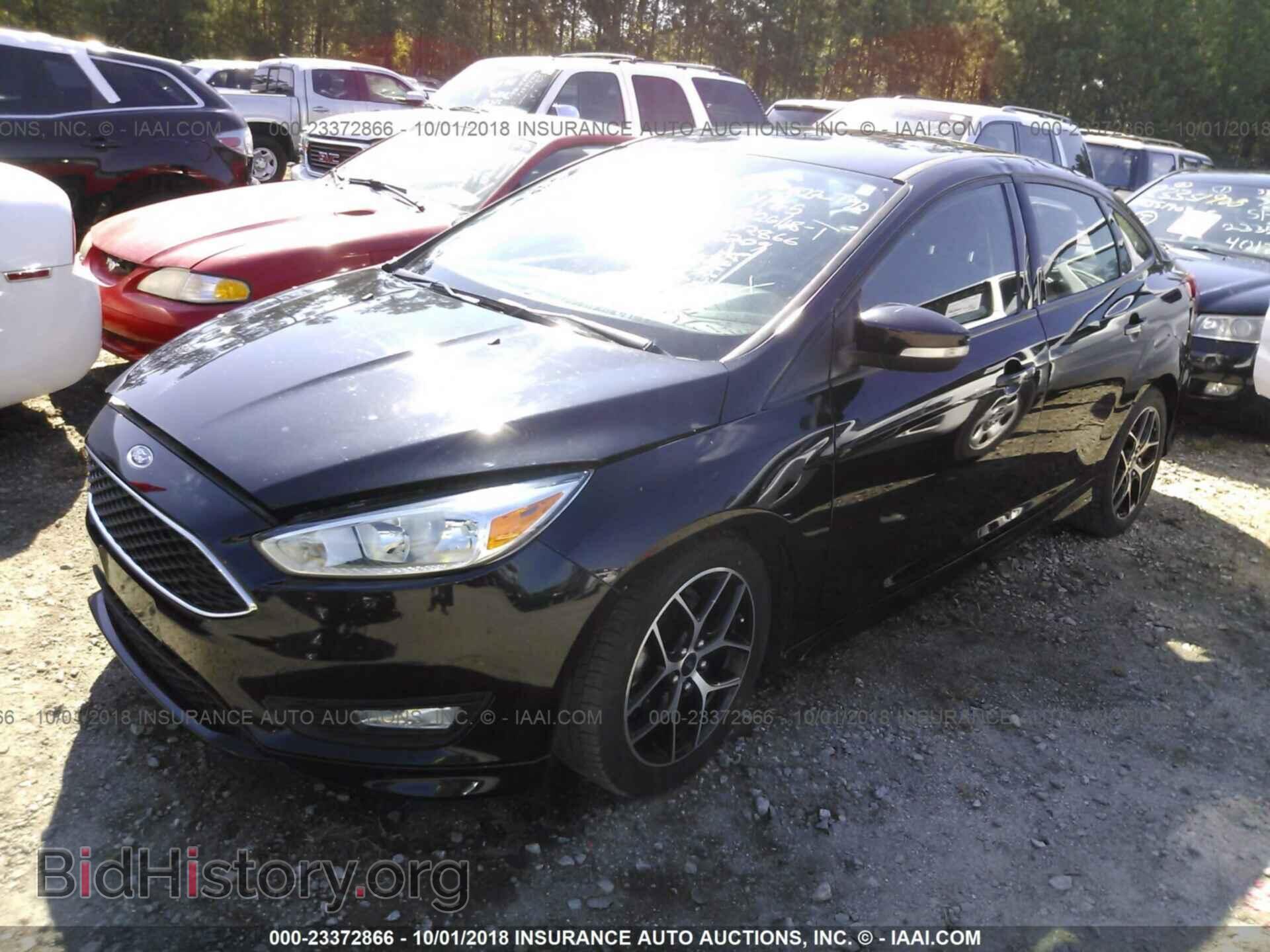 2015 Ford Focus - VIN: 1FADP3F22FL238209 - Photo 2