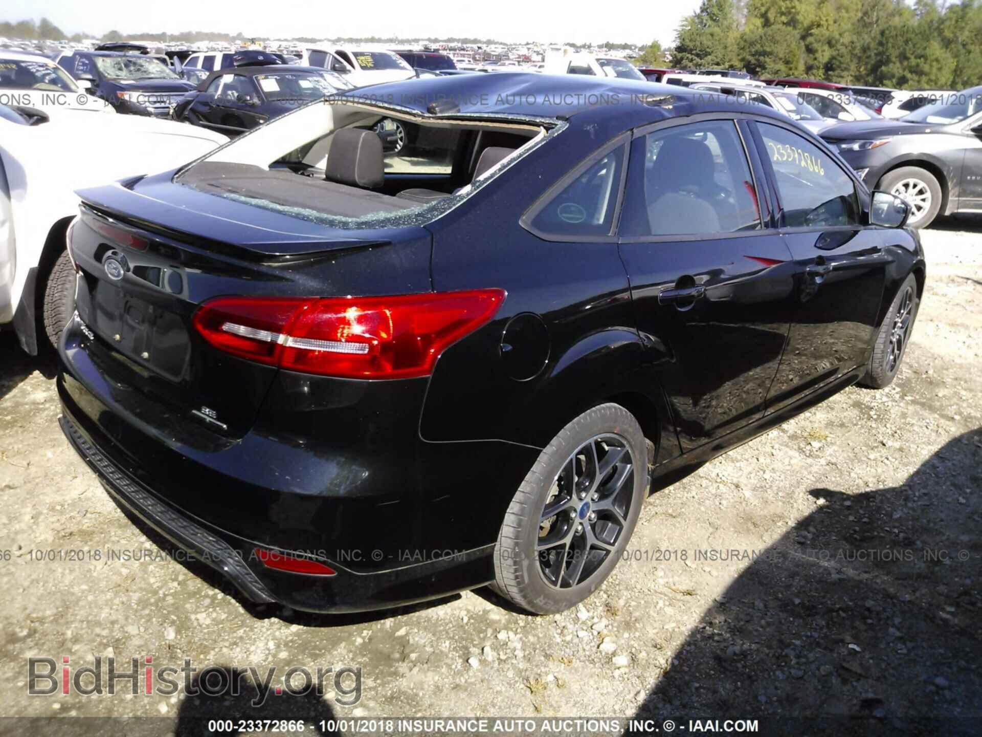 2015 Ford Focus - VIN: 1FADP3F22FL238209 - Photo 4