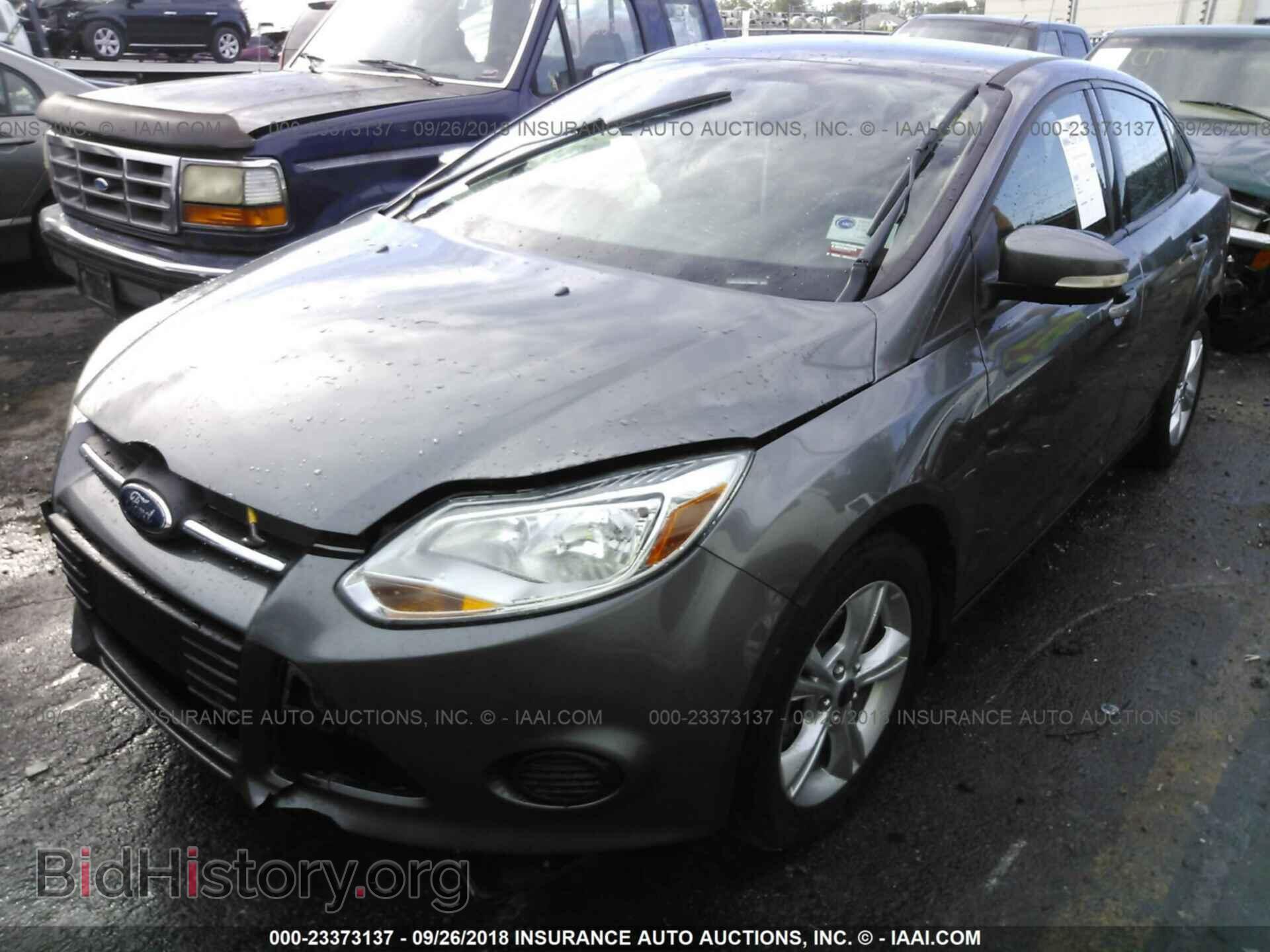 2014 Ford Focus - VIN: 1FADP3F22EL109966 - Фото 2
