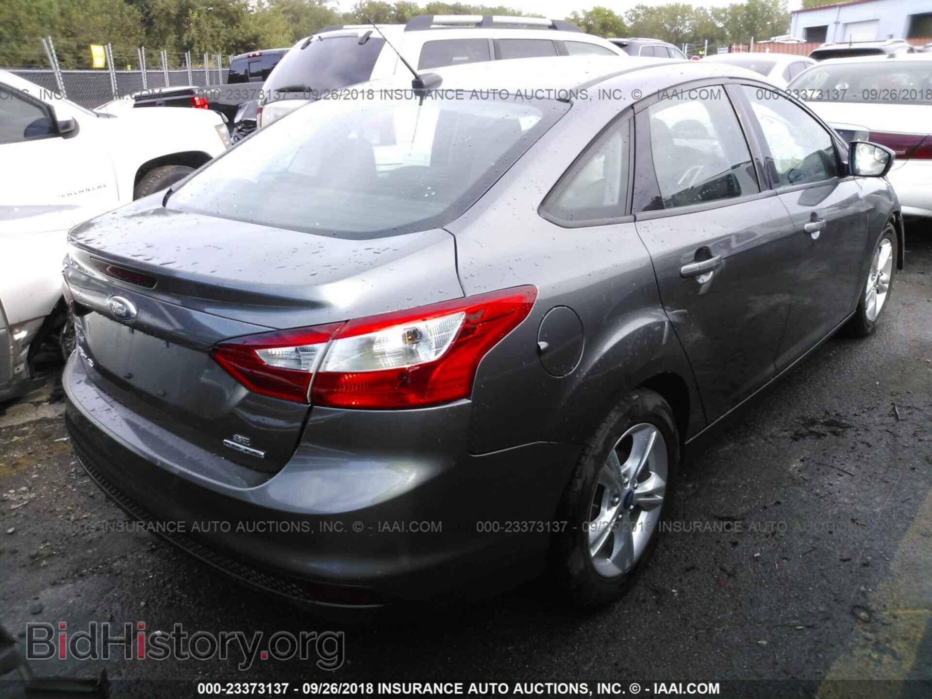 2014 Ford Focus - VIN: 1FADP3F22EL109966 - Фото 4
