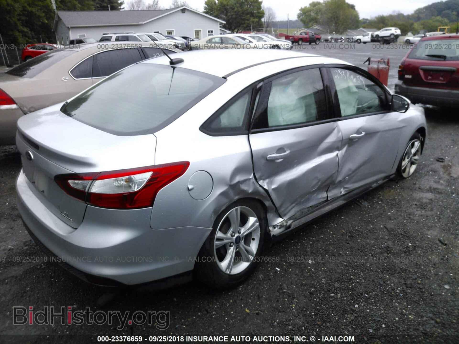 2014 Ford Focus - VIN: 1FADP3F29EL128255 - Photo 4