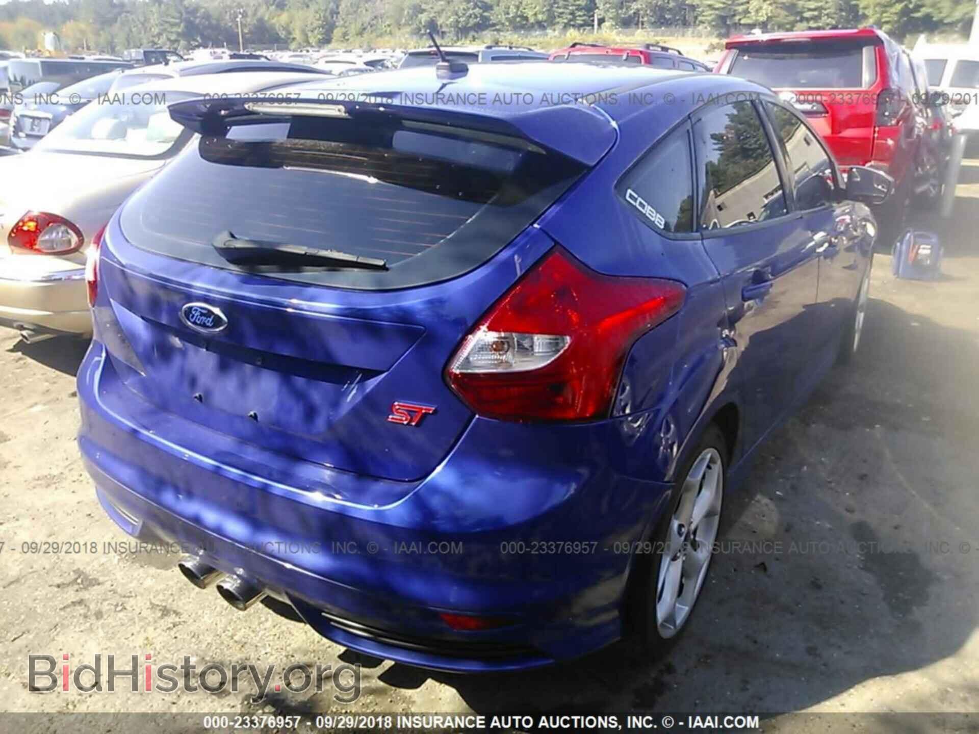2014 Ford Focus - VIN: 1FADP3L99EL409053 - Photo 4