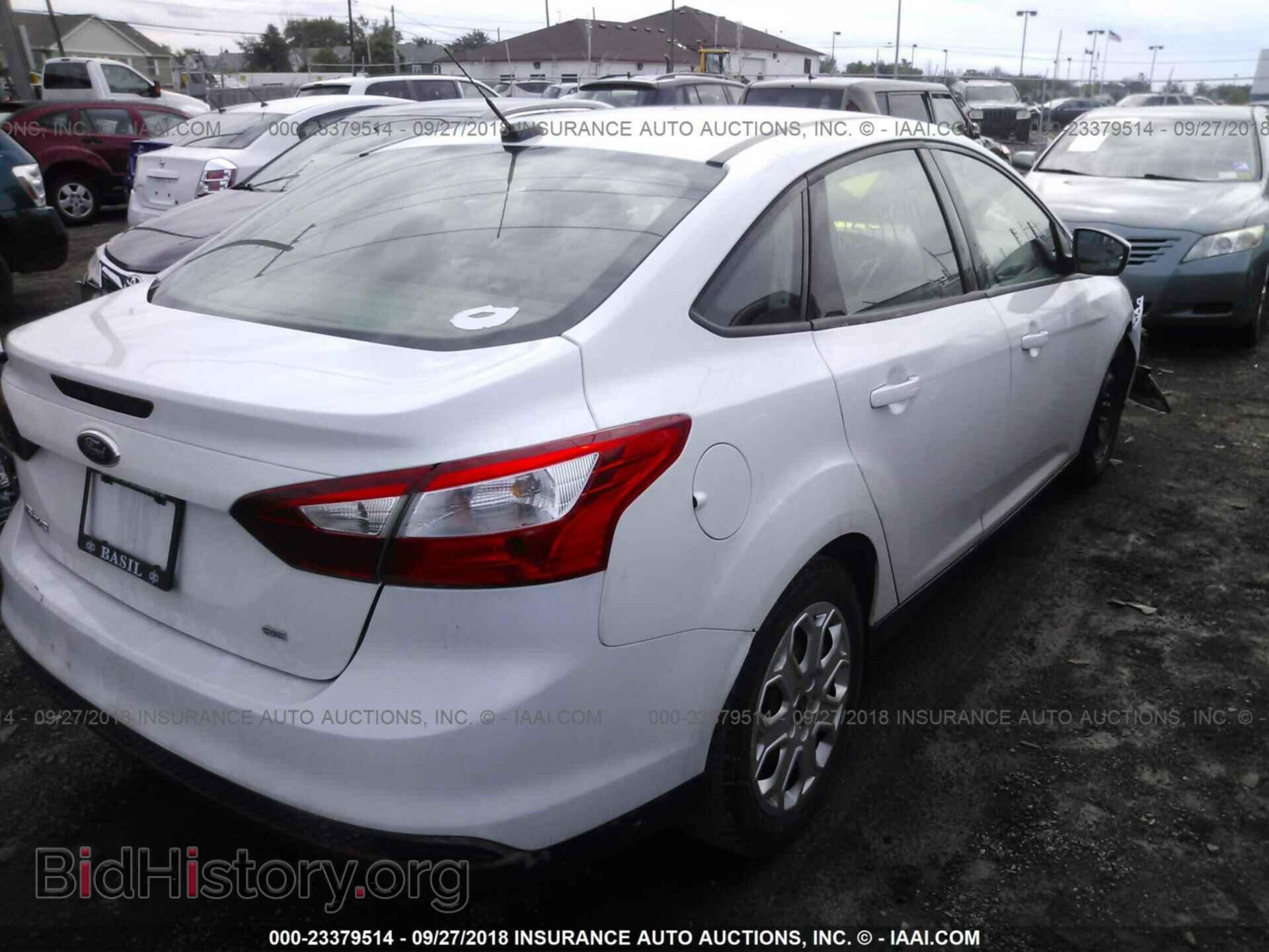 2012 Ford Focus - VIN: 1FAHP3F24CL299543 - Photo 4