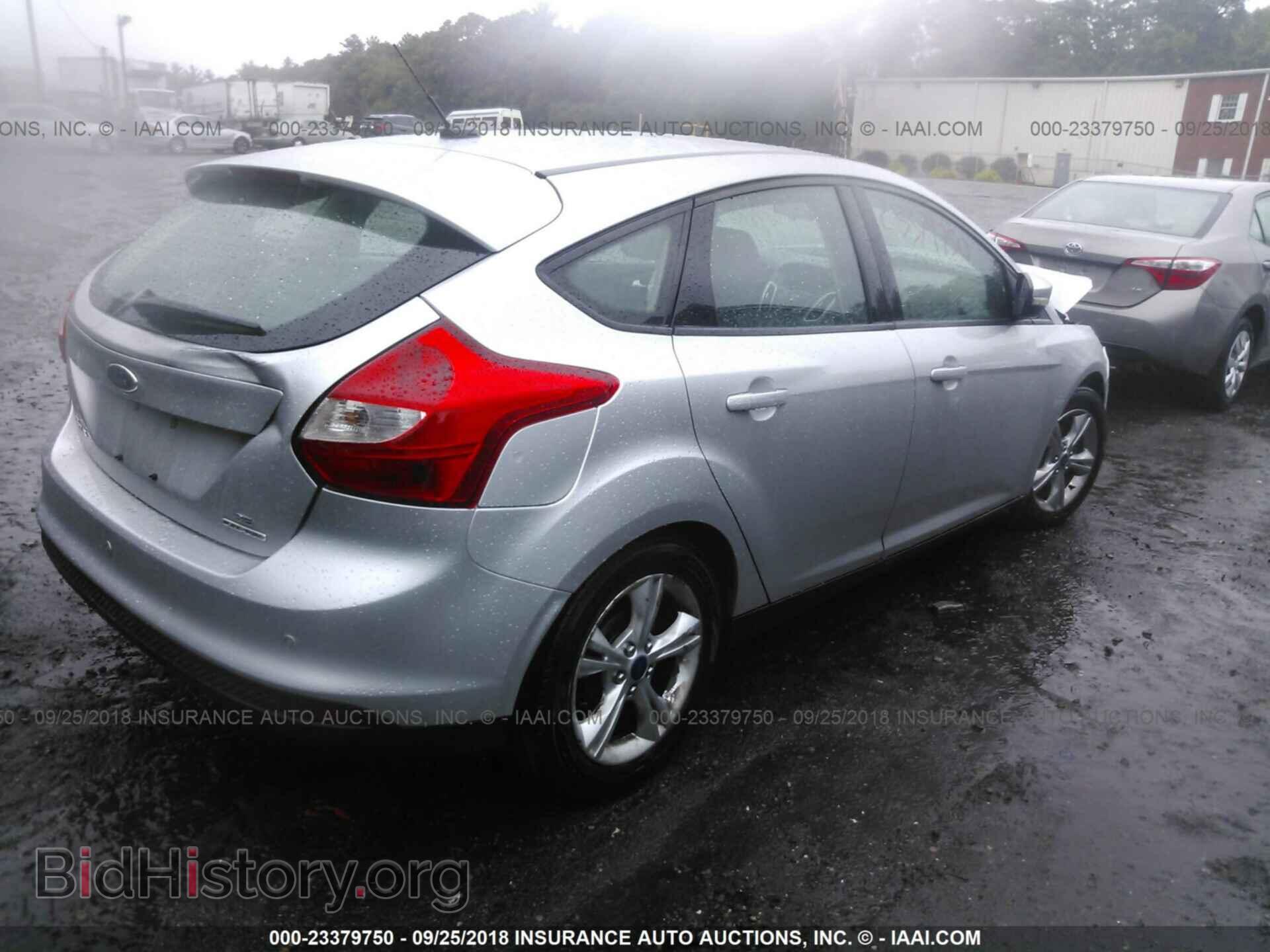 2014 Ford Focus - VIN: 1FADP3K23EL209287 - Фото 4