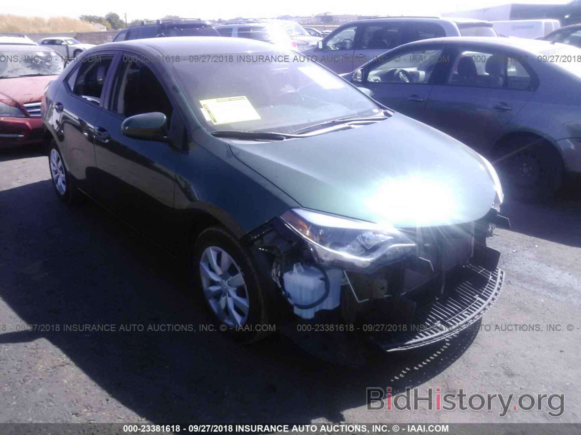 Photo 5YFBURHE7EP058329 - Toyota Corolla 2014