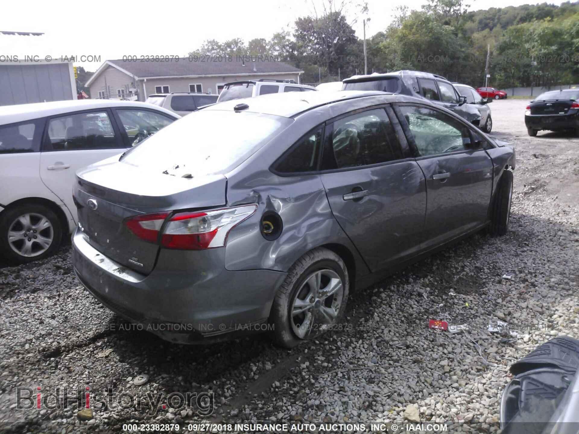 2014 Ford Focus - VIN: 1FADP3F29EL459577 - Фото 4