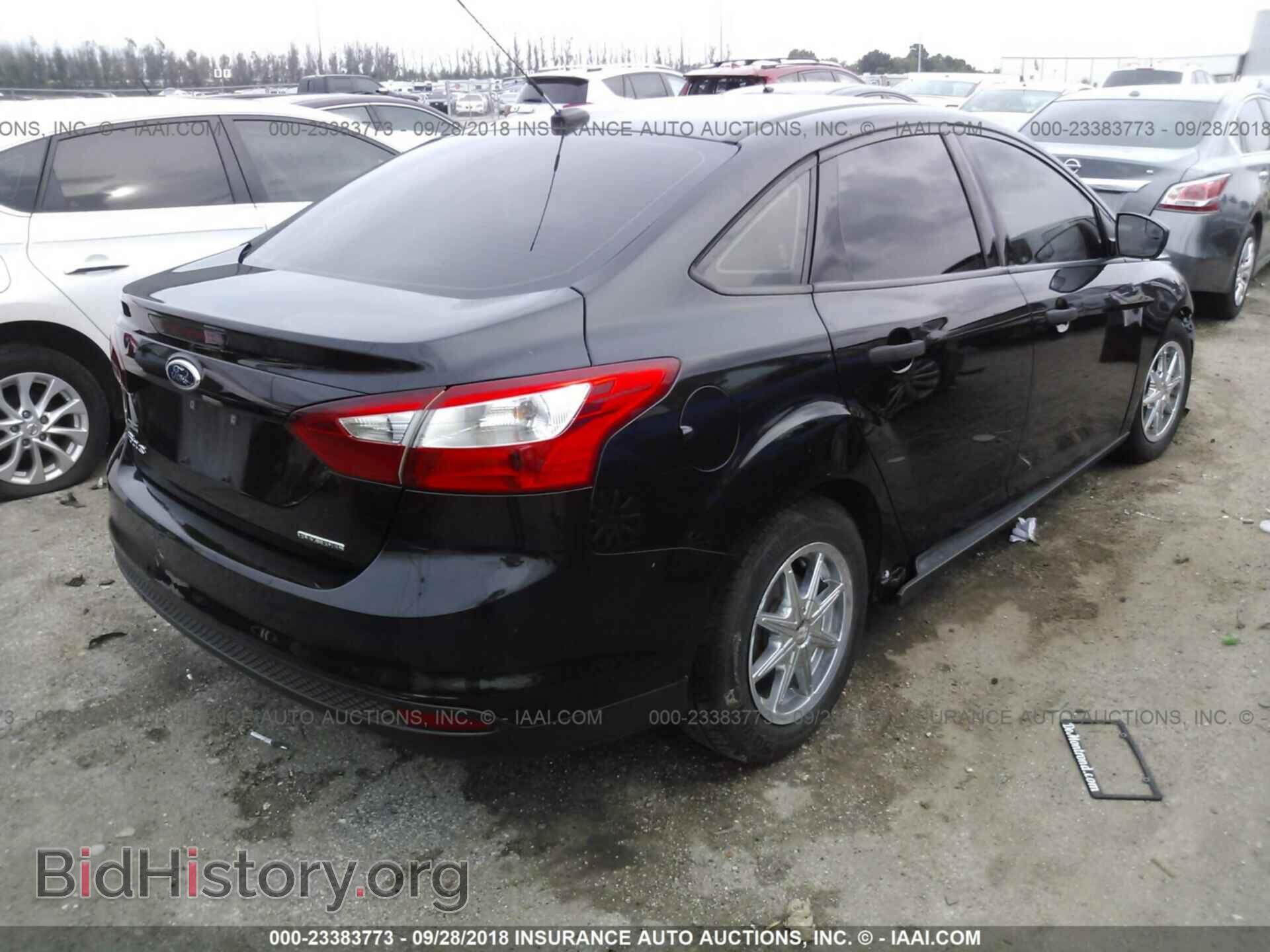 2014 Ford Focus - VIN: 1FADP3E25EL412872 - Фото 4
