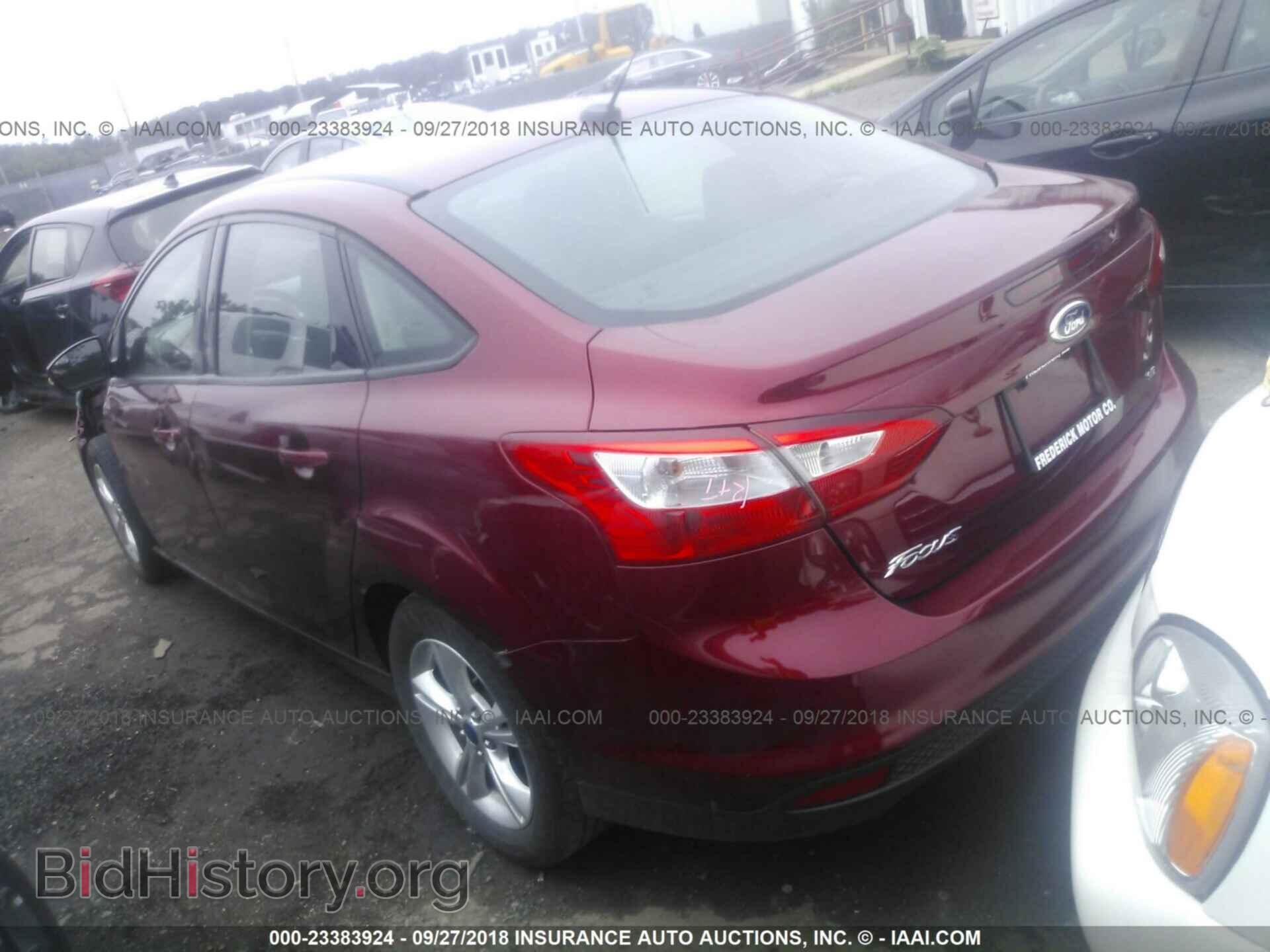 2014 Ford Focus - VIN: 1FADP3F21EL106279 - Фото 3