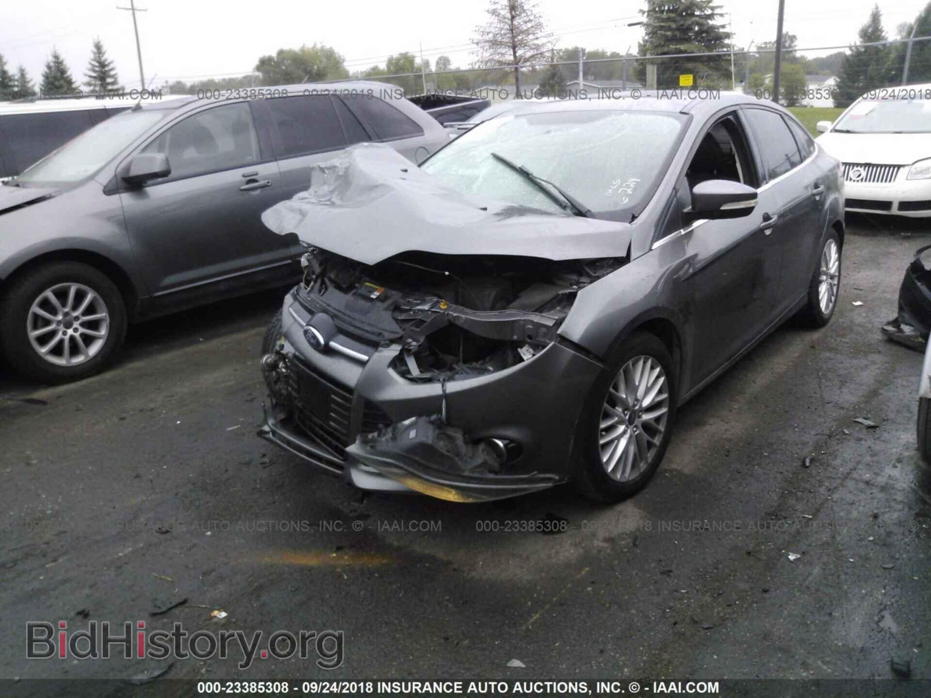 2013 Ford Focus - VIN: 1FADP3J24DL256229 - Фото 2