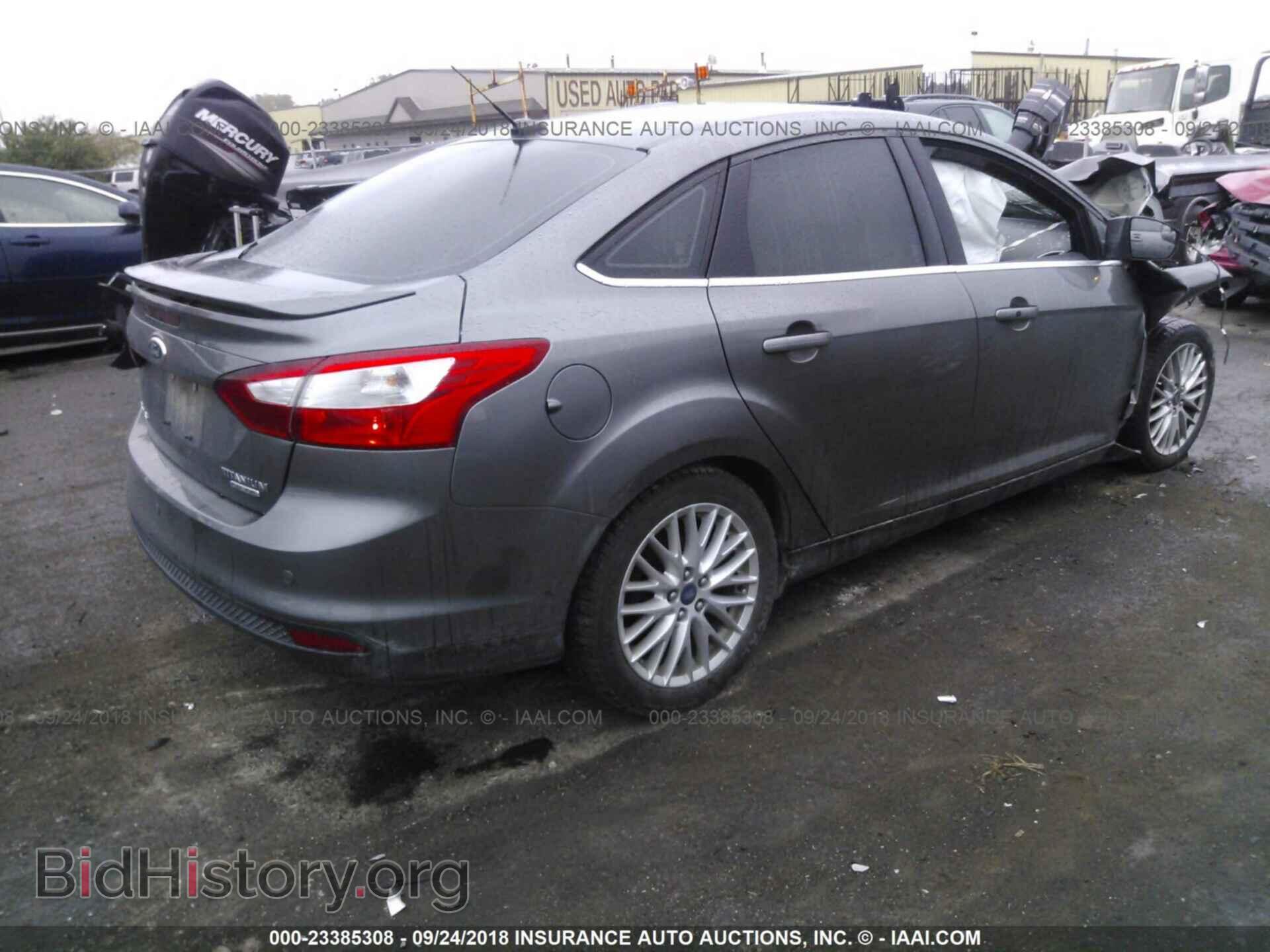 2013 Ford Focus - VIN: 1FADP3J24DL256229 - Фото 4