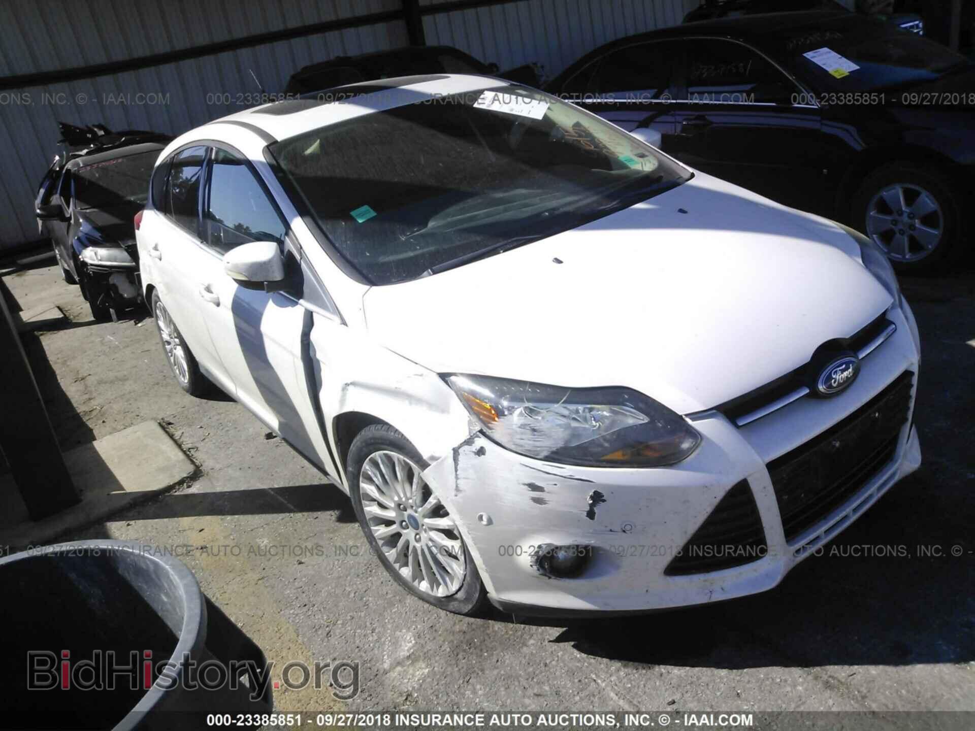 Фотография 1FAHP3N28CL181111 - Ford Focus 2012