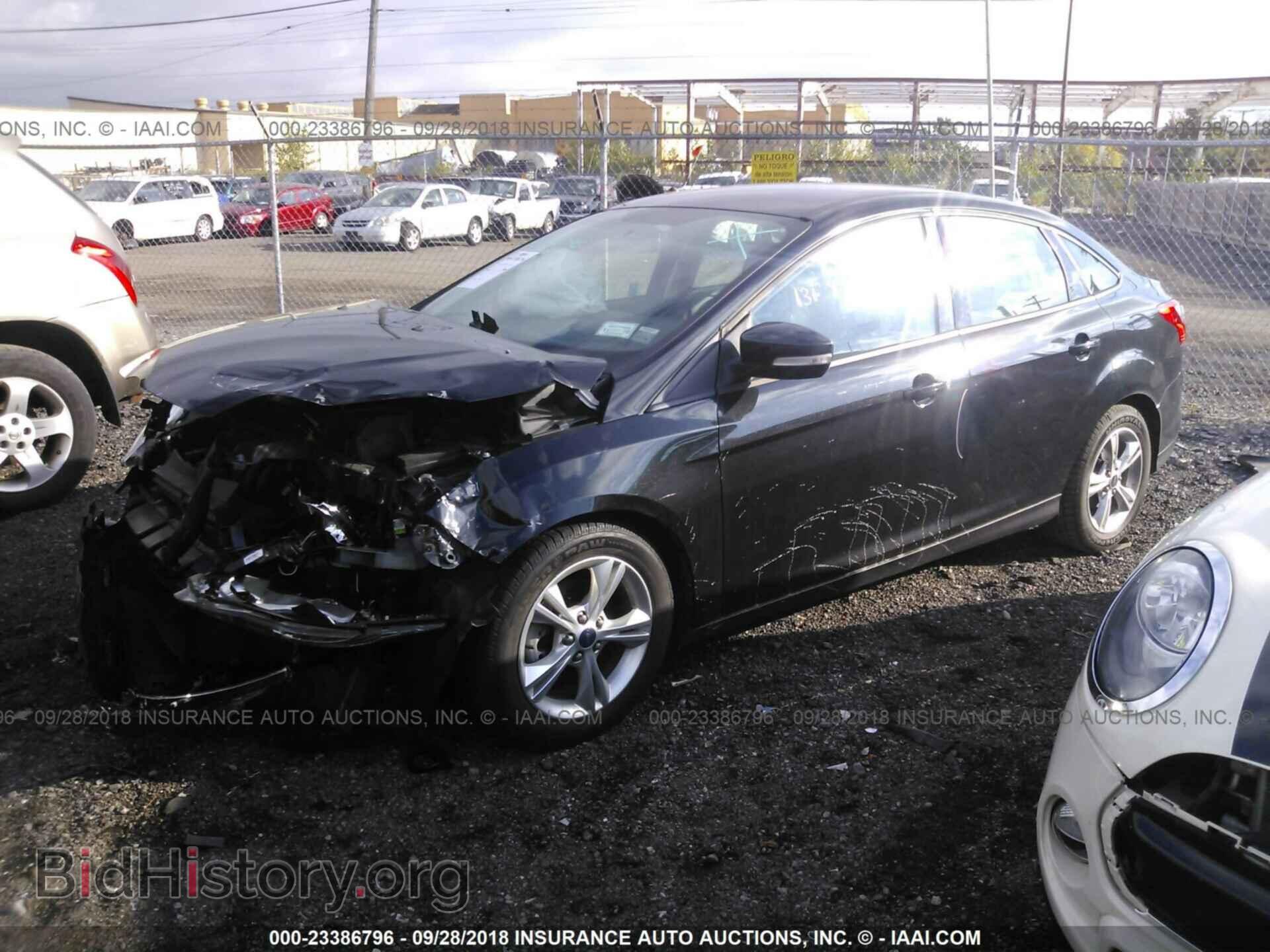 2014 Ford Focus - VIN: 1FADP3F2XEL245097 - Photo 2