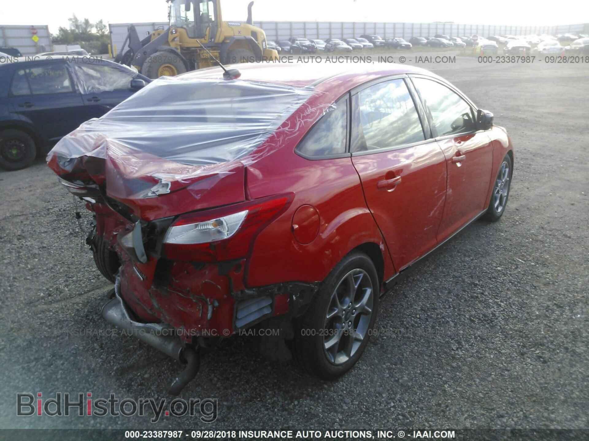 2014 Ford Focus - VIN: 1FADP3F21EL261169 - Фото 4