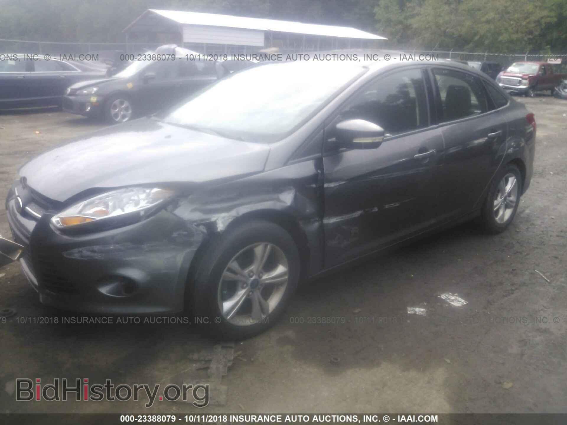 2014 Ford Focus - VIN: 1FADP3F26EL334522 - Фото 2
