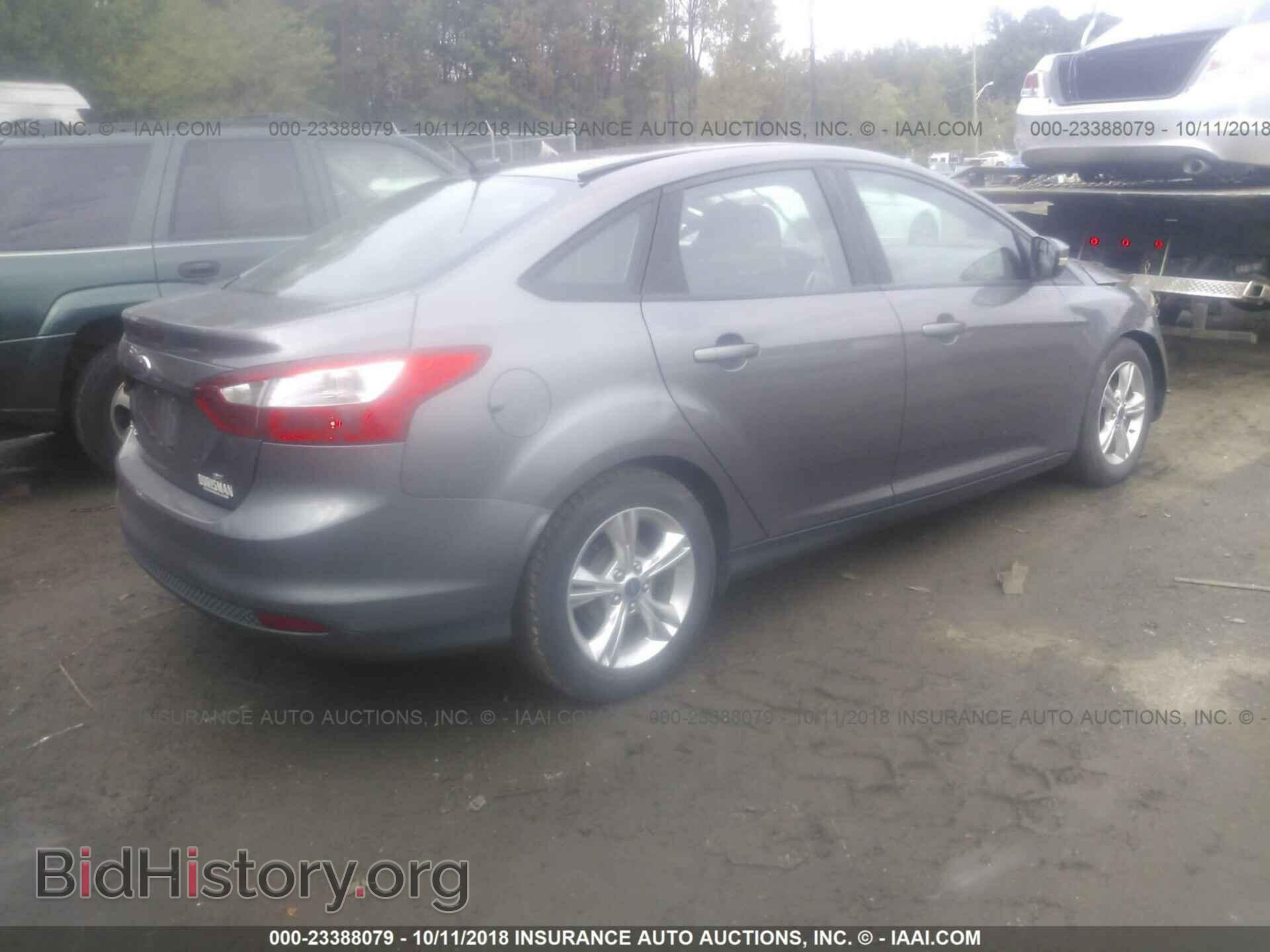 2014 Ford Focus - VIN: 1FADP3F26EL334522 - Фото 4