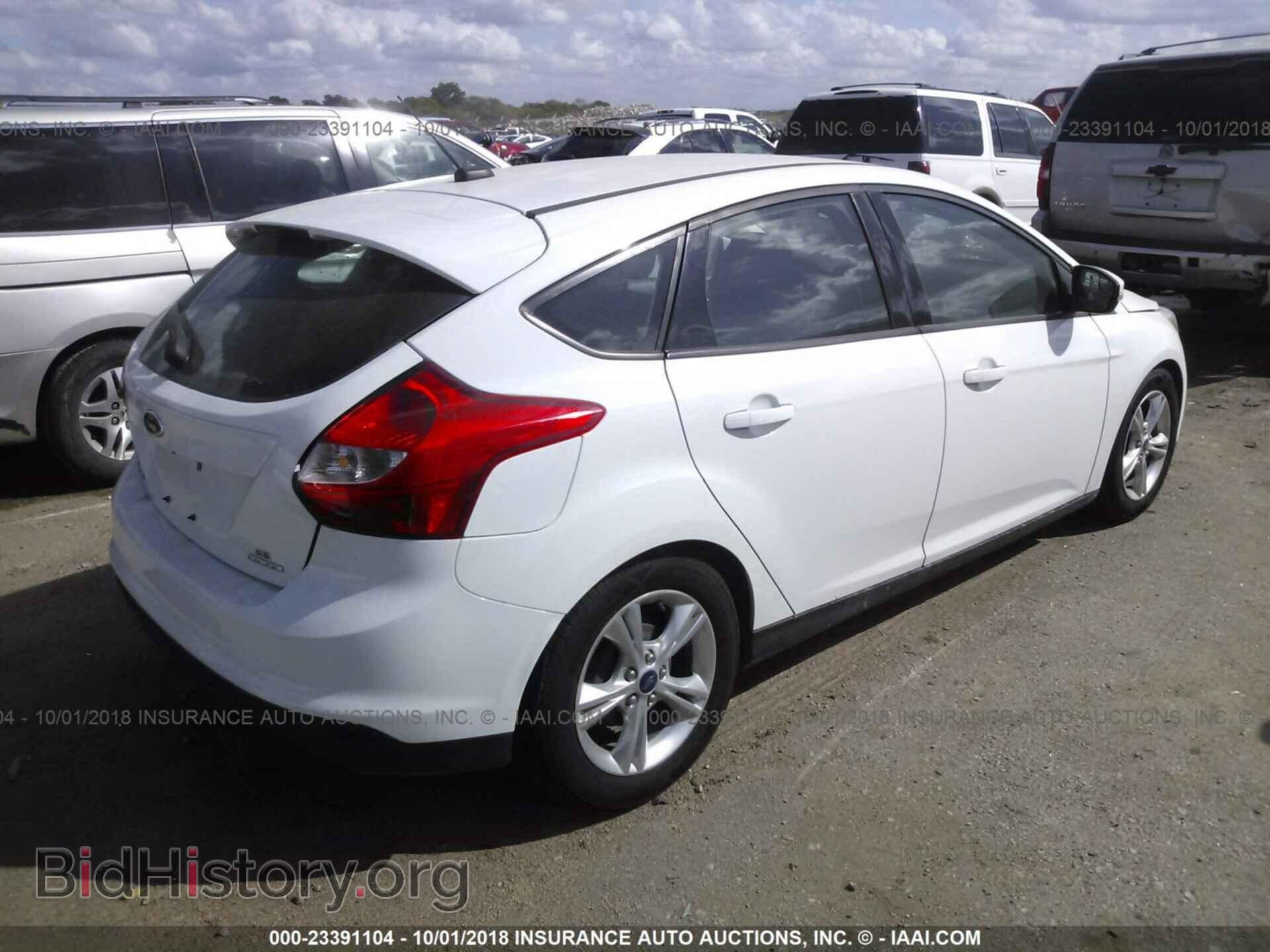 2014 Ford Focus - VIN: 1FADP3K21EL393208 - Photo 4