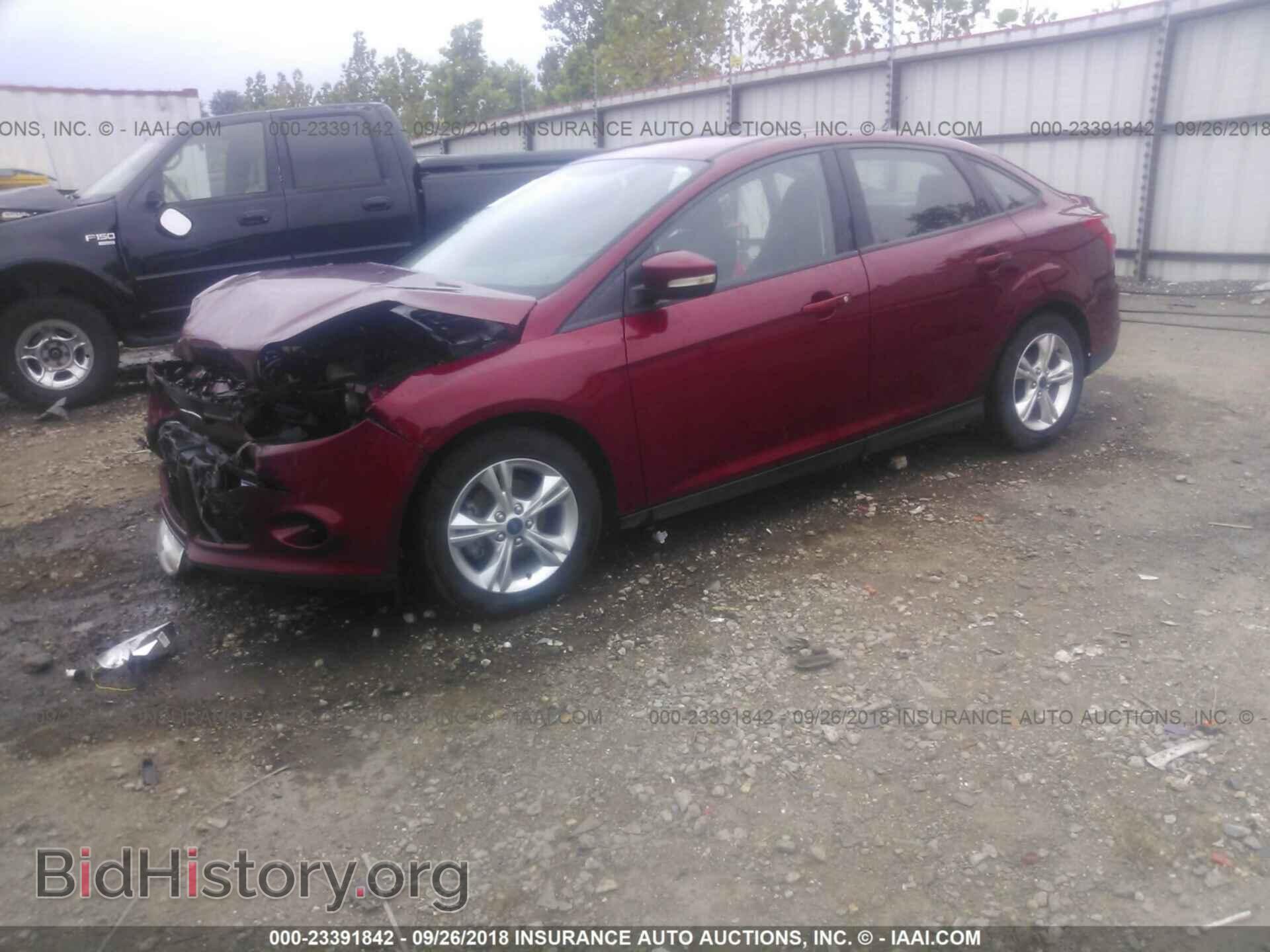 2014 Ford Focus - VIN: 1FADP3F25EL110013 - Фото 2