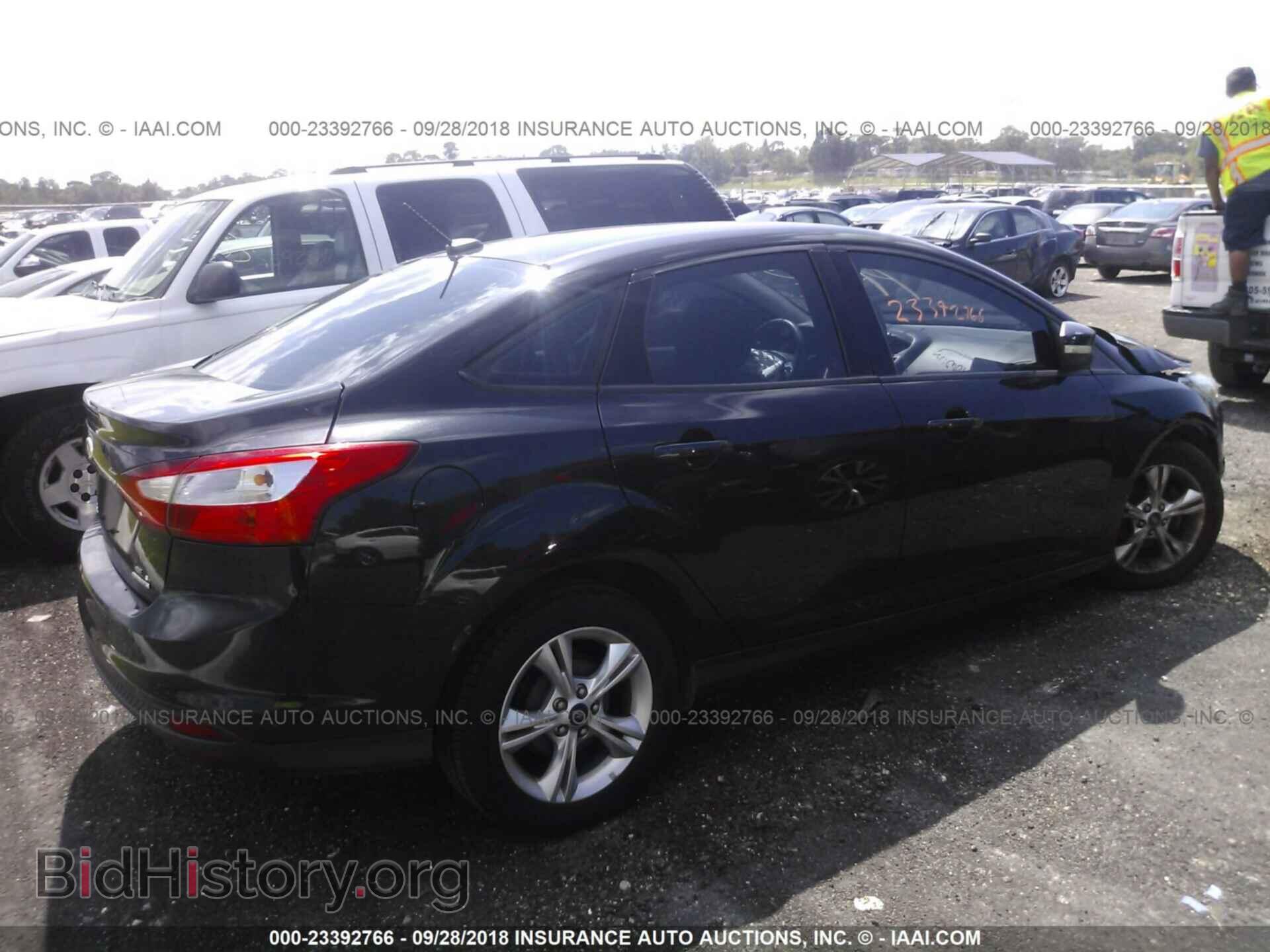 2013 Ford Focus - VIN: 1FADP3F22DL309244 - Фото 4