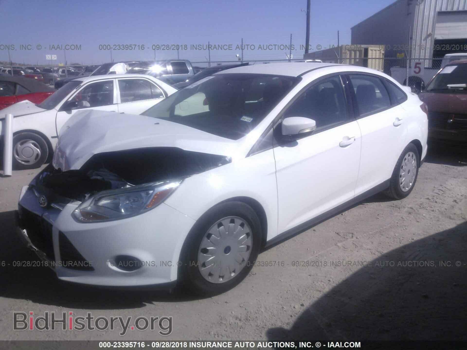 2014 Ford Focus - VIN: 1FADP3F27EL453616 - Фото 2