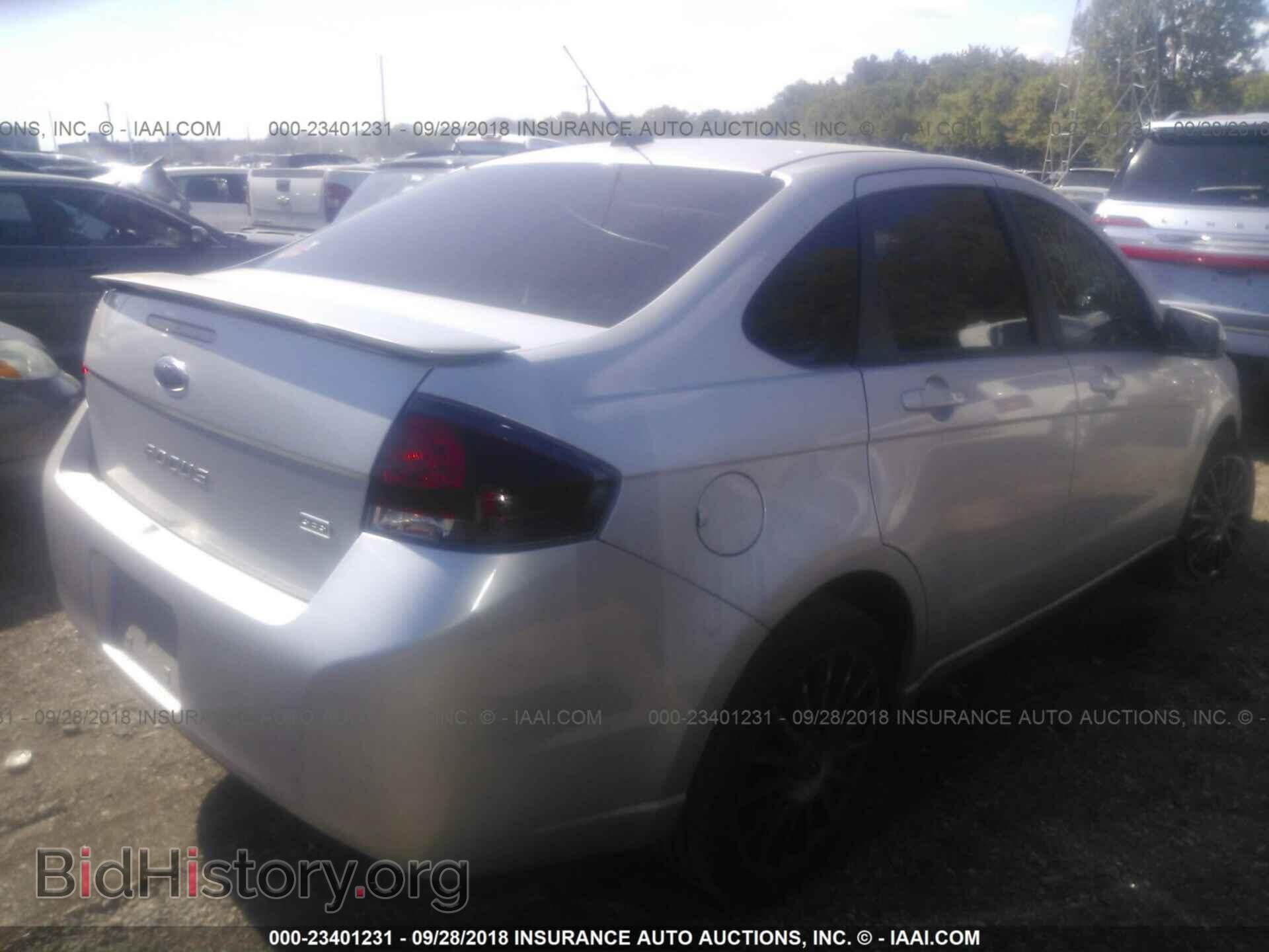 2011 Ford Focus - VIN: 1FAHP3GN5BW145199 - Photo 4
