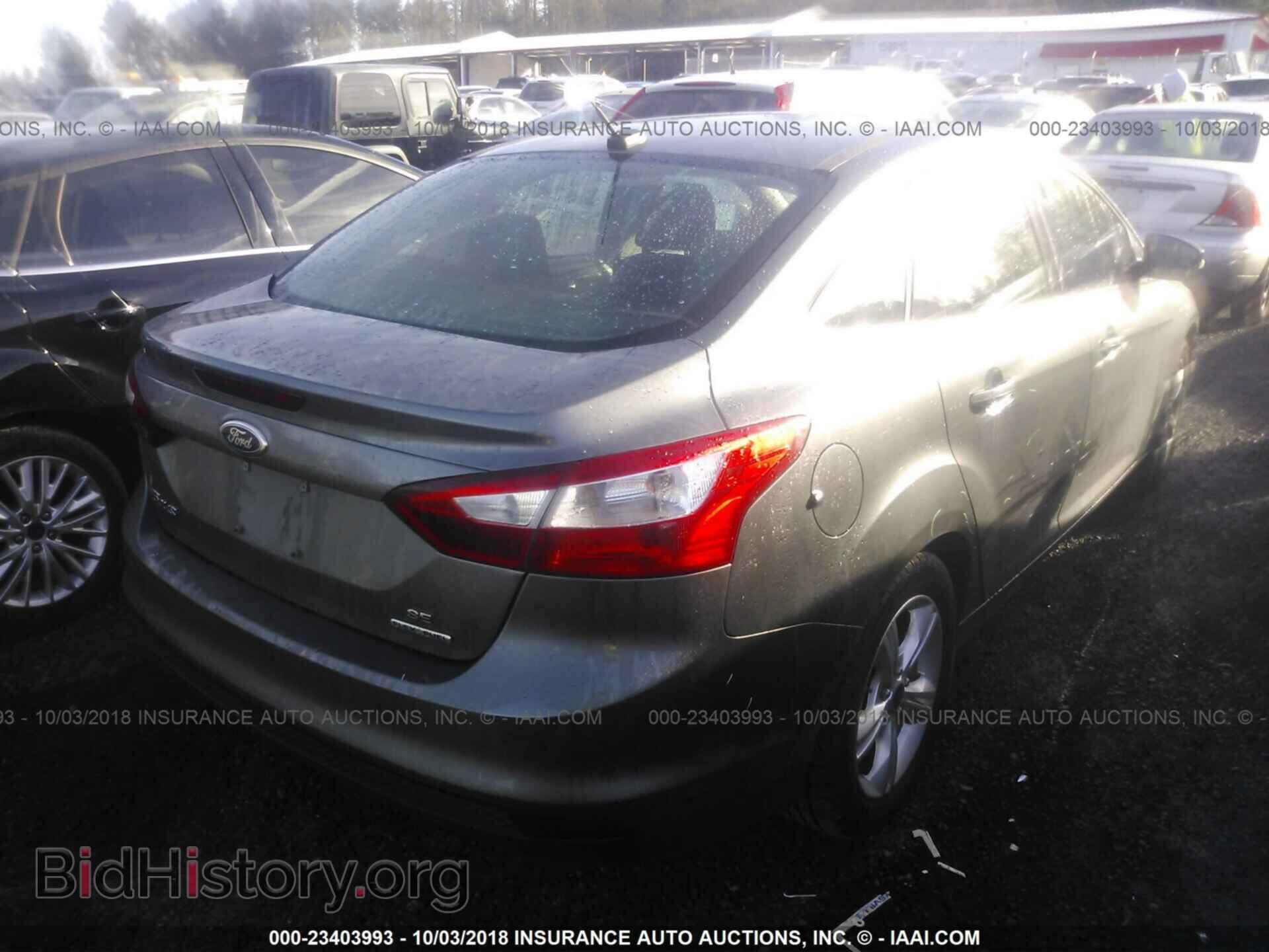 2013 Ford Focus - VIN: 1FADP3F28DL290795 - Фото 4