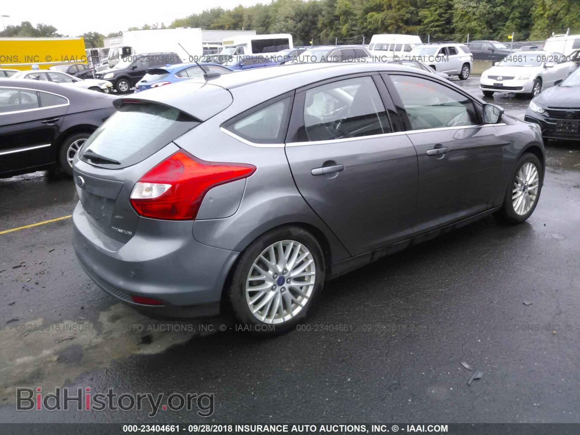 2014 Ford Focus - VIN: 1FADP3N27EL329332 - Photo 4