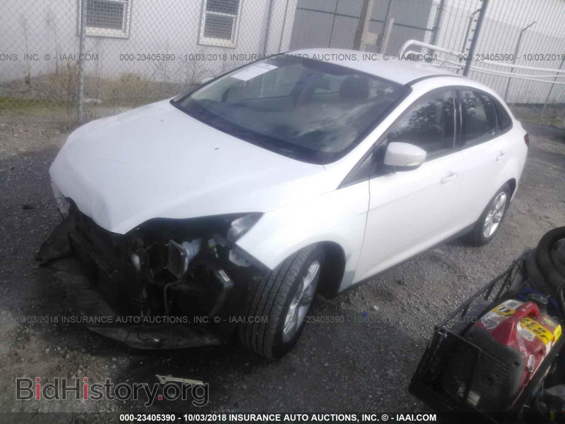 2014 Ford Focus - VIN: 1FADP3F27EL381896 - Фото 2