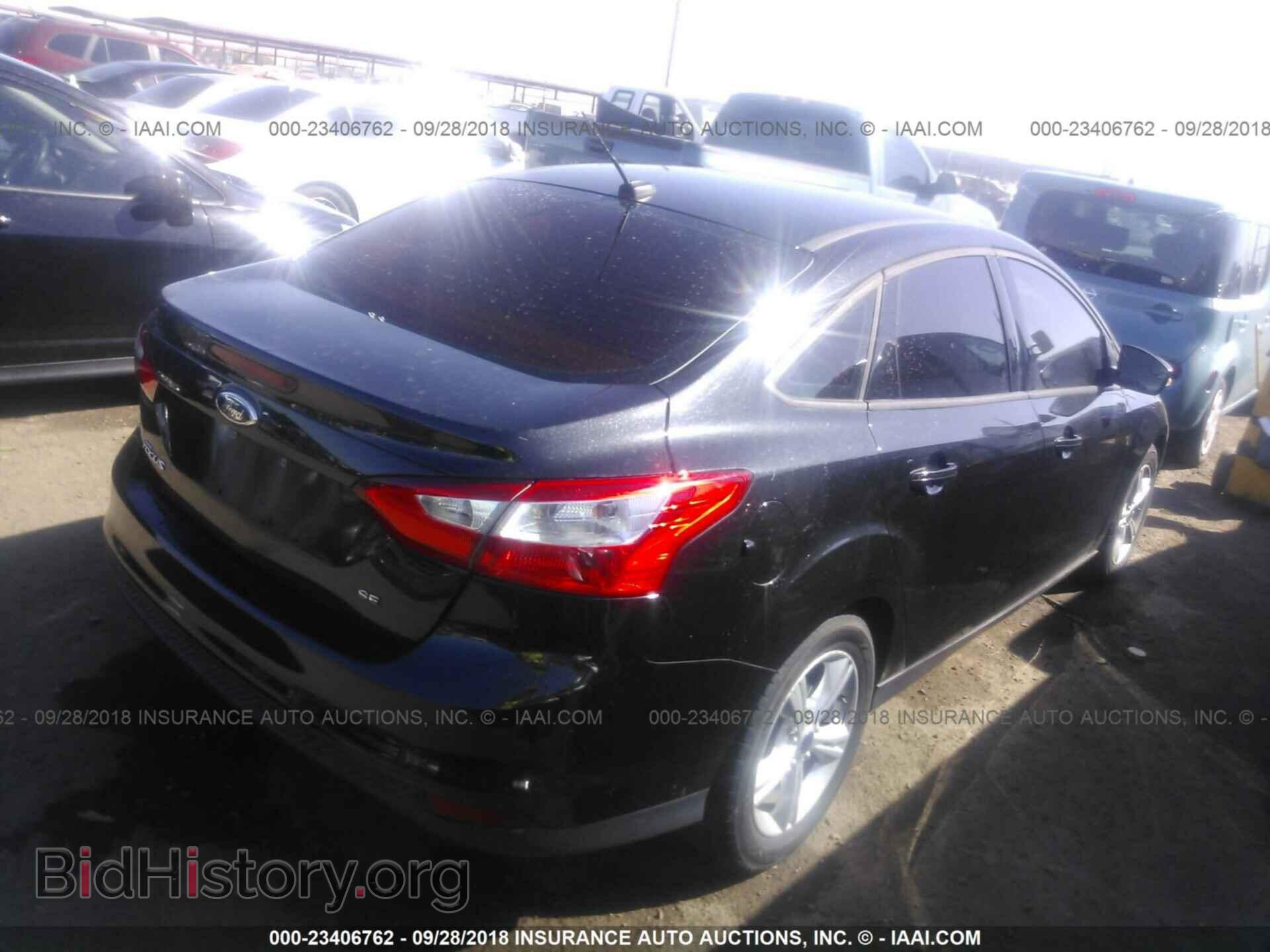 2013 Ford Focus - VIN: 1FADP3F25DL229601 - Photo 4