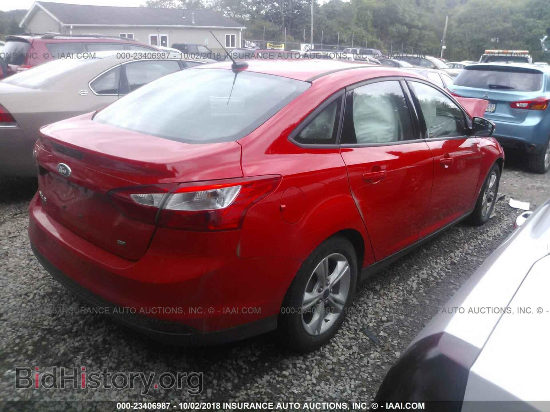 2014 Ford Focus - VIN: 1FADP3F21EL361241 - Фото 4