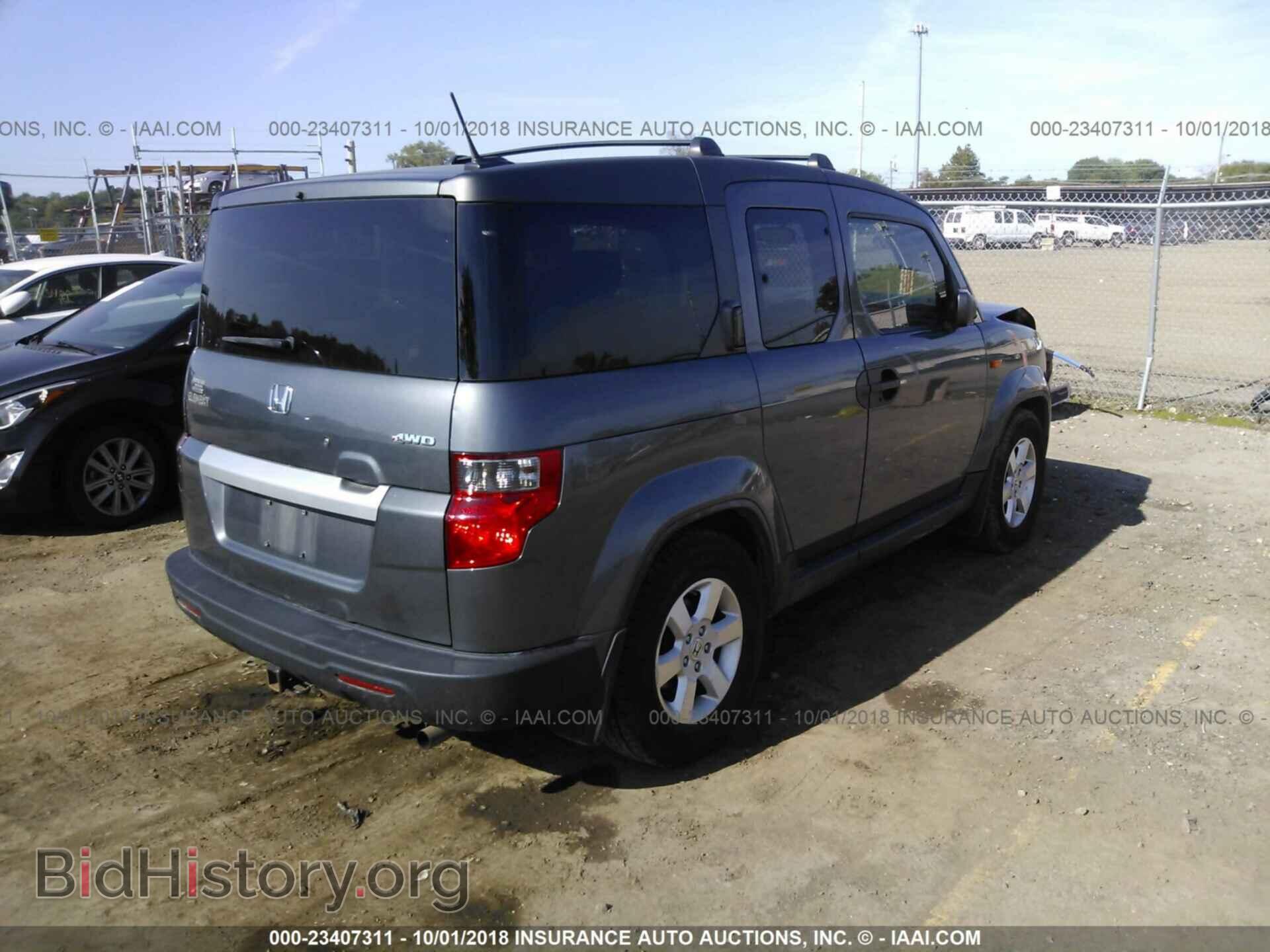 2011 Honda Element - VIN: 5J6YH2H76BL006714 - Фото 4