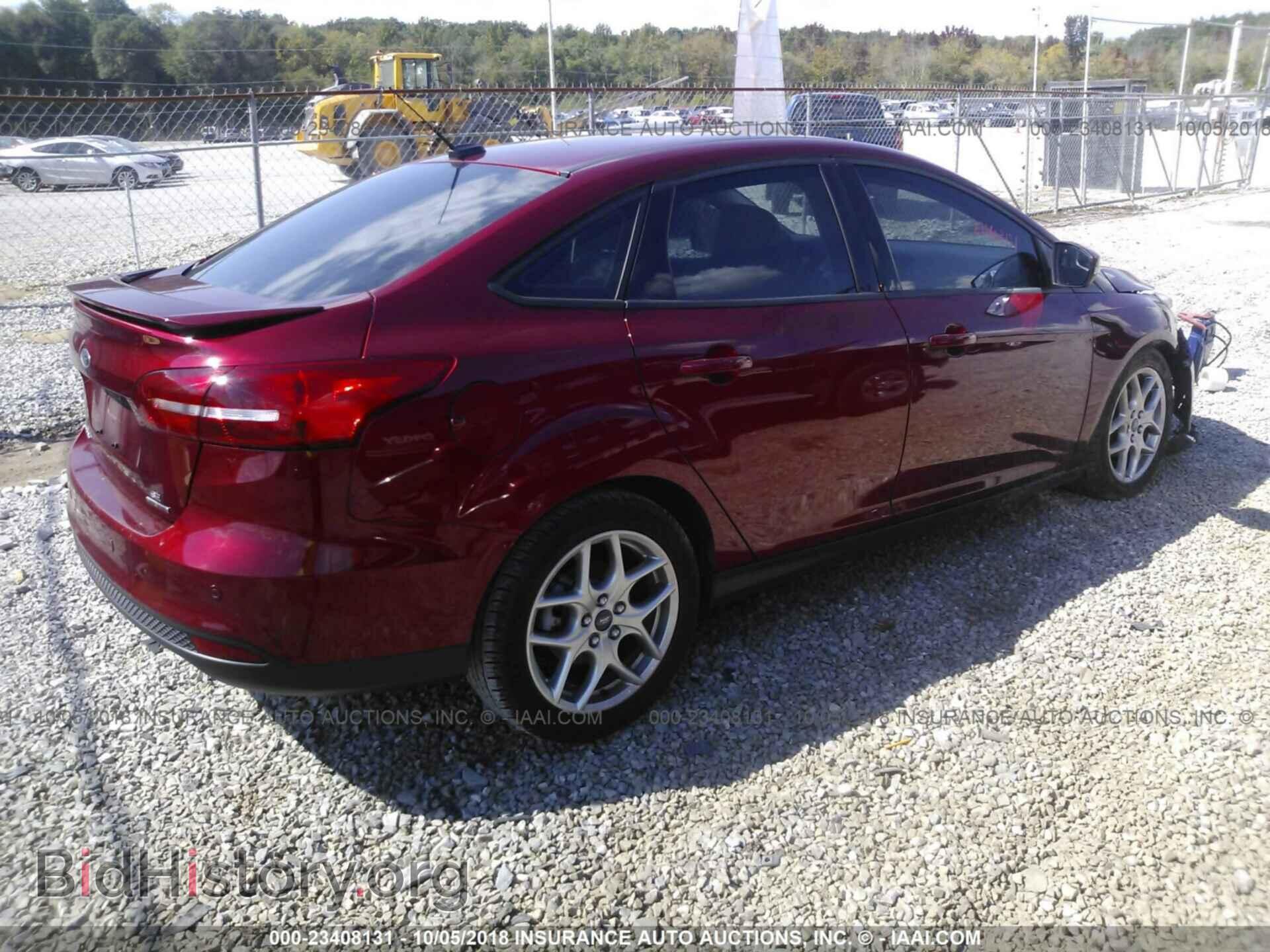 2015 Ford Focus - VIN: 1FADP3F27FL304172 - Photo 4