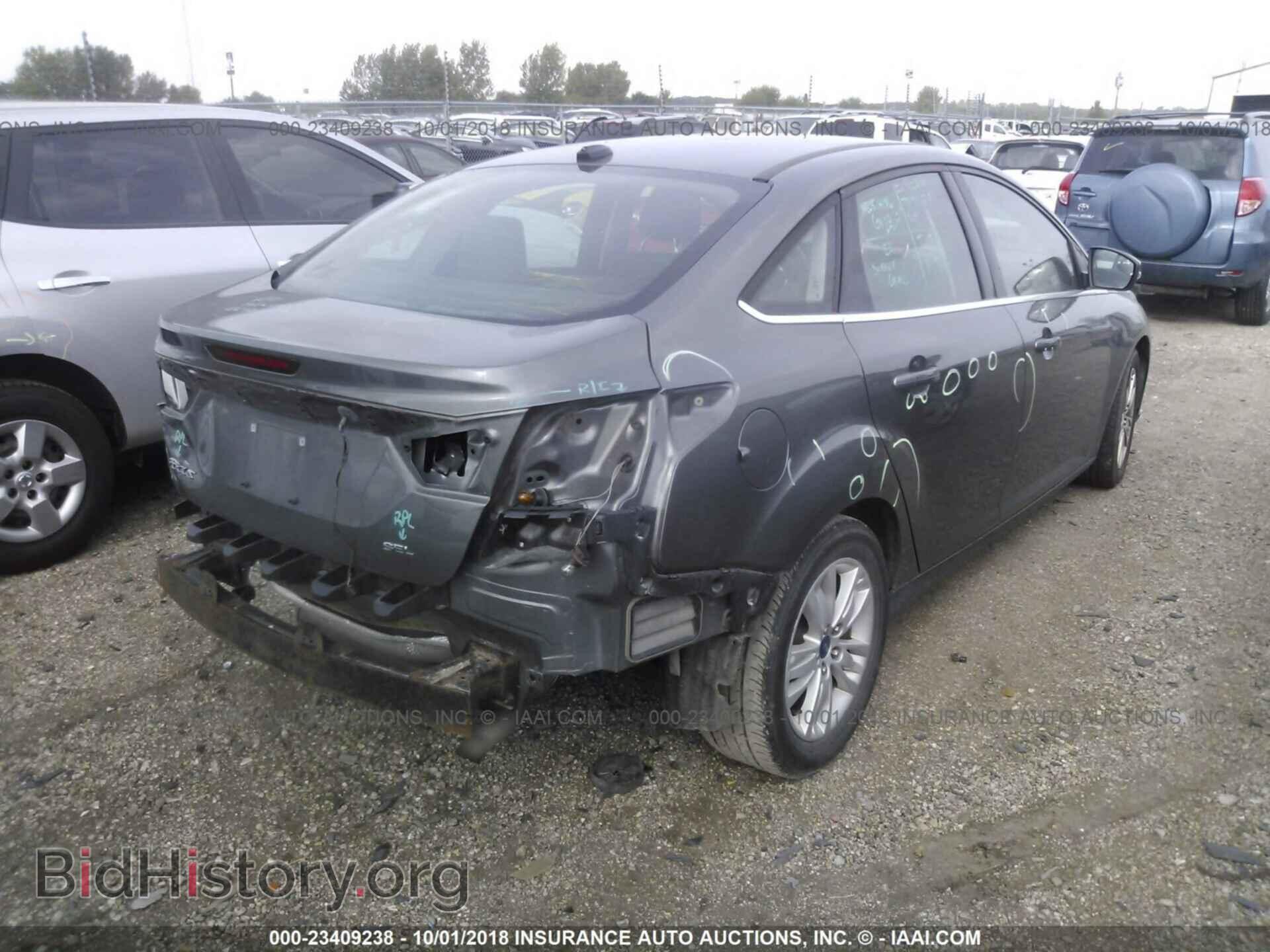 2012 Ford Focus - VIN: 1FAHP3H22CL330883 - Photo 4