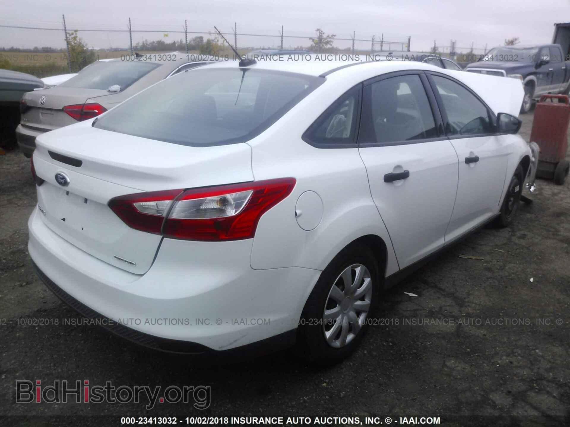 2014 Ford Focus - VIN: 1FADP3E29EL382985 - Фото 4