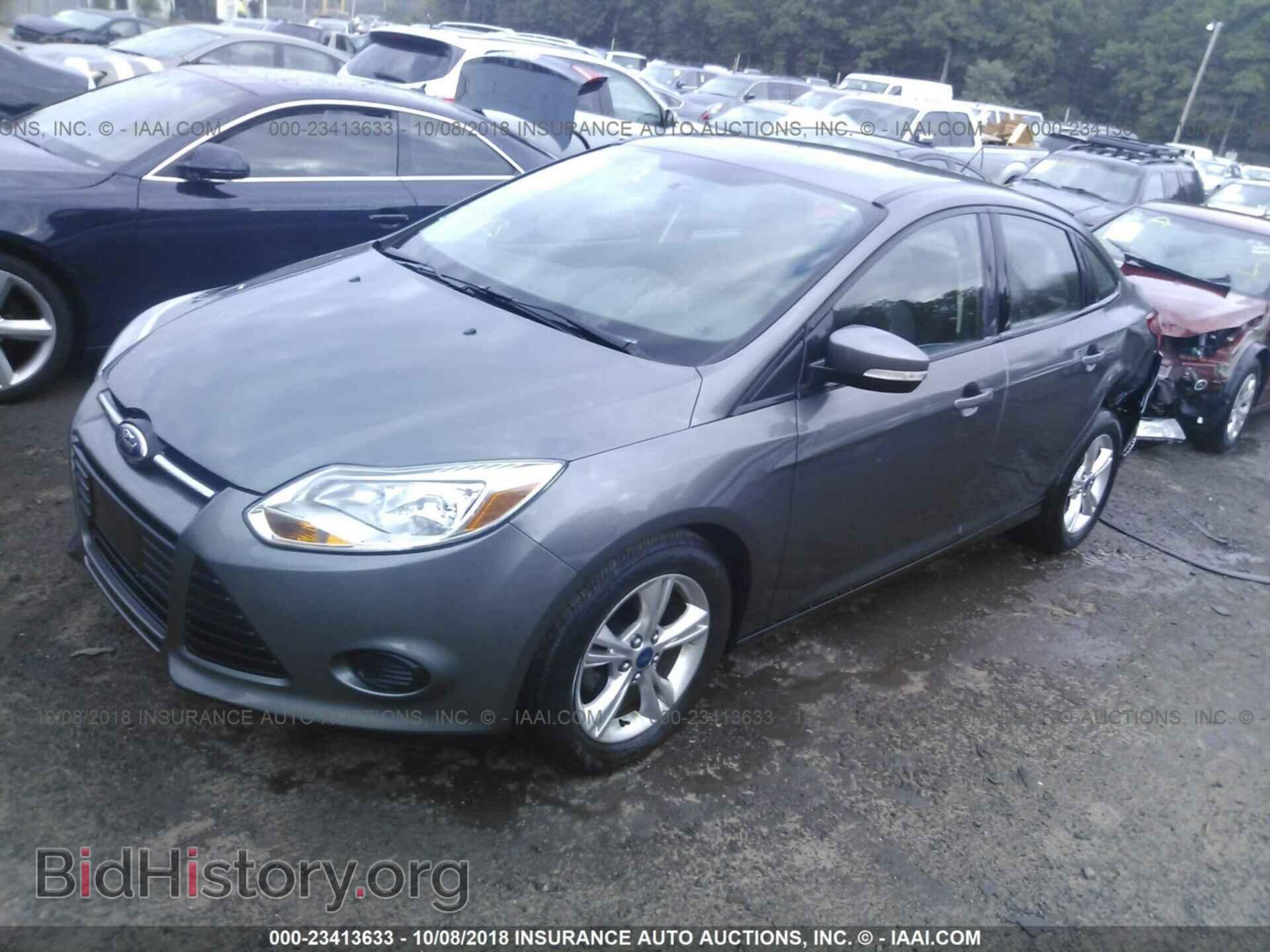 2014 Ford Focus - VIN: 1FADP3F29EL104537 - Фото 2