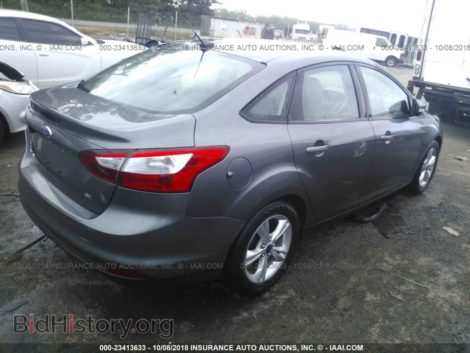 2014 Ford Focus - VIN: 1FADP3F29EL104537 - Фото 4