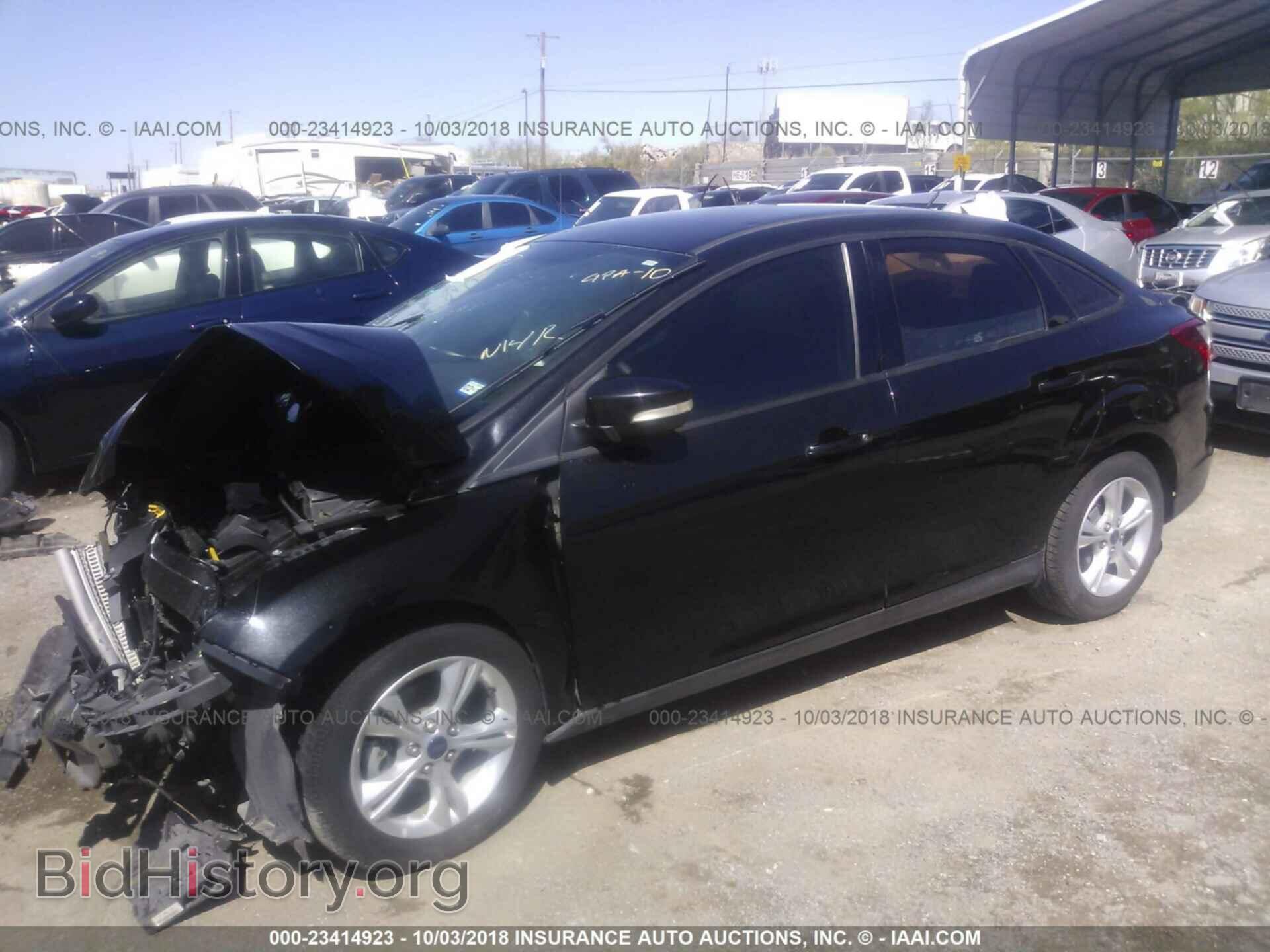 2014 Ford Focus - VIN: 1FADP3F22EL372720 - Фото 2