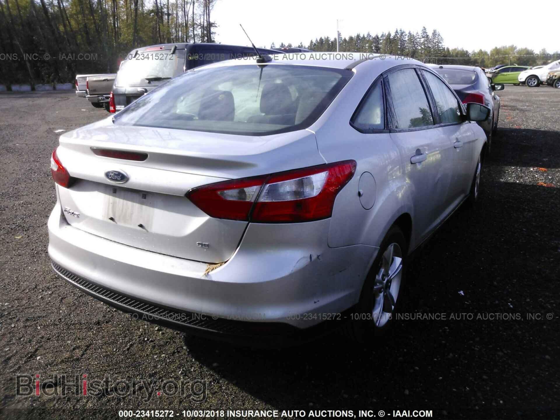 2014 Ford Focus - VIN: 1FADP3F27EL312321 - Photo 4