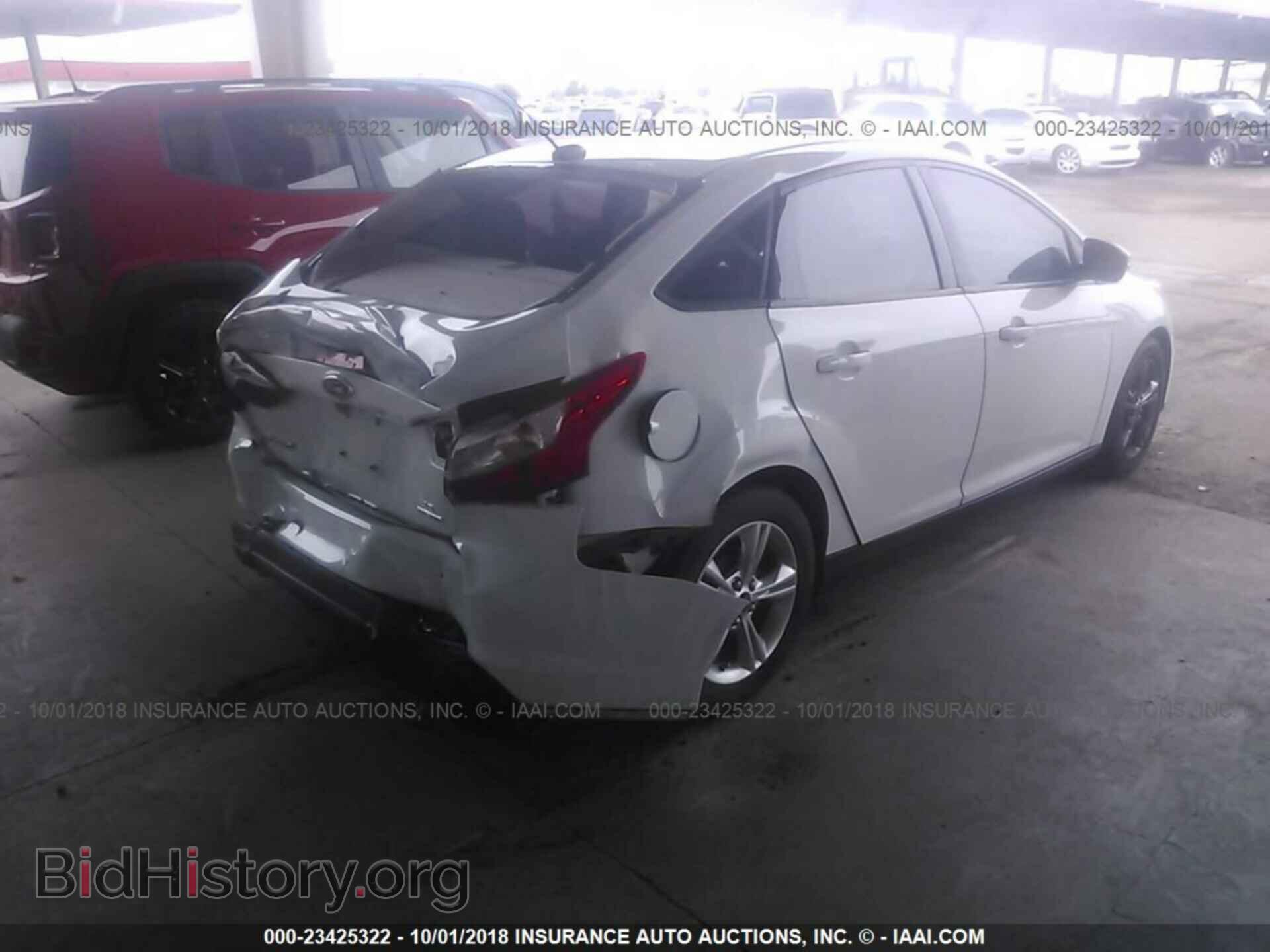 2014 Ford Focus - VIN: 1FADP3F2XEL237789 - Photo 4