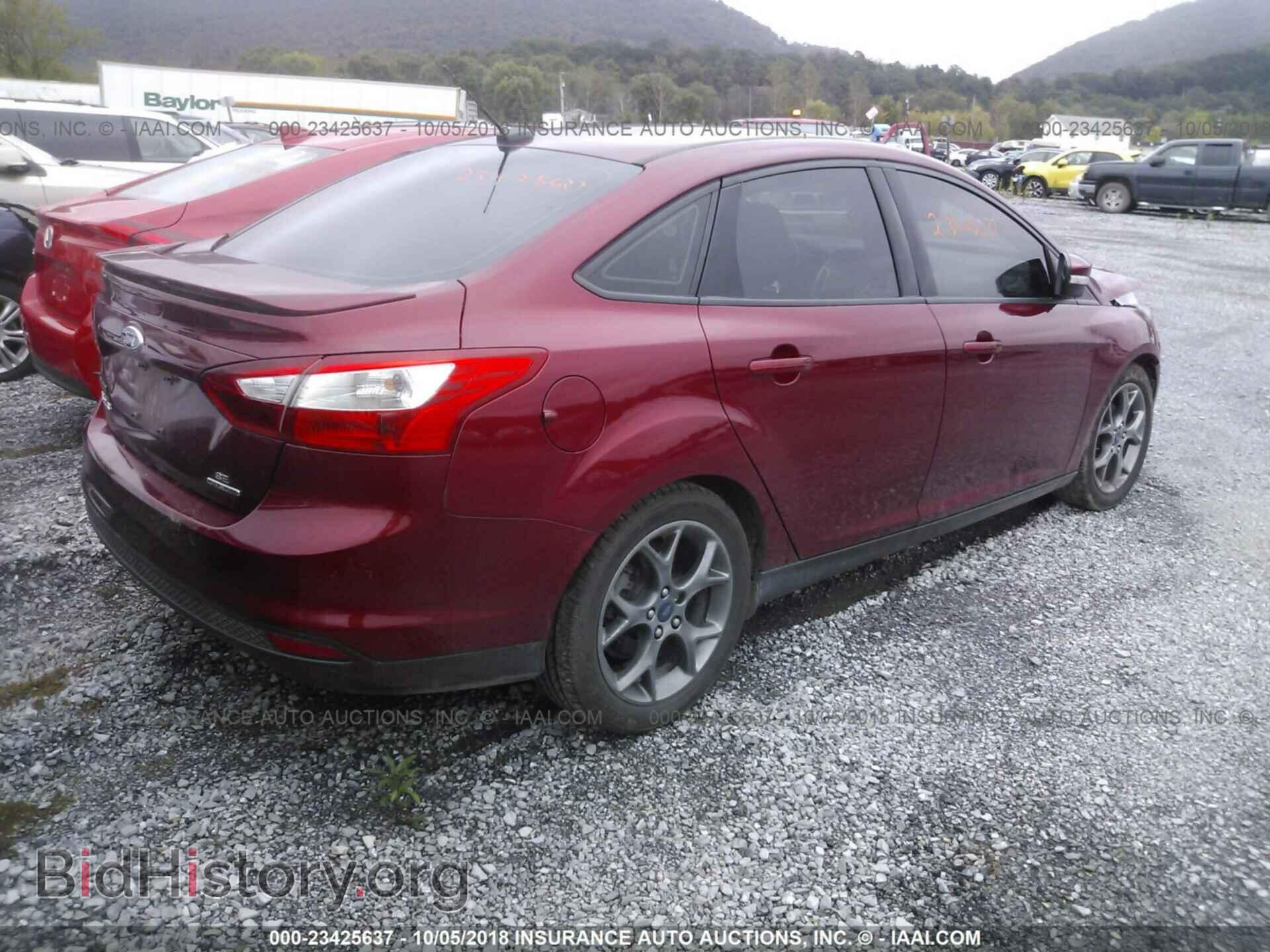 2014 Ford Focus - VIN: 1FADP3F25EL406505 - Photo 4