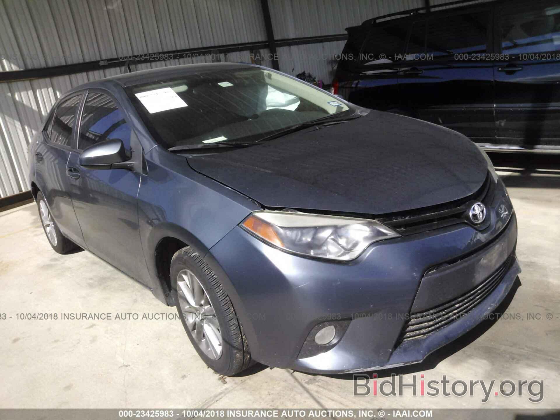 Photo 5YFBURHE5EP050021 - Toyota Corolla 2014