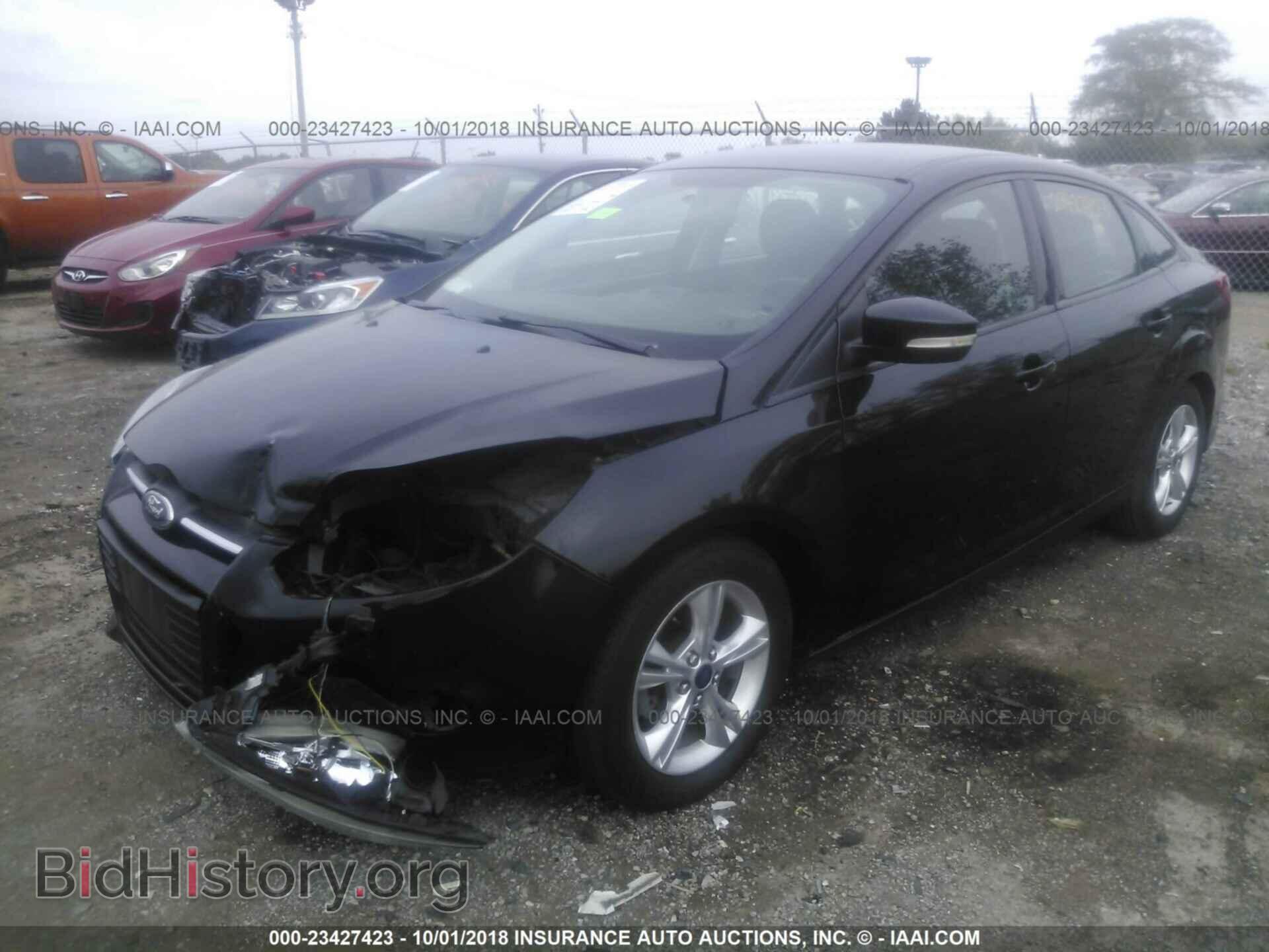 2014 Ford Focus - VIN: 1FADP3F21EL369341 - Photo 2