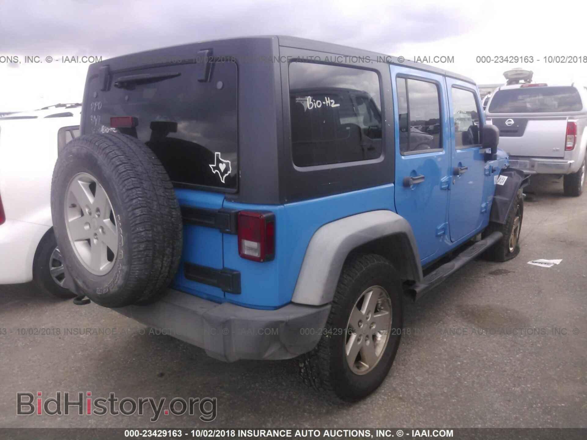 2011 Jeep Wrangler - VIN: 1J4BA3H17BL626323 - Фото 4