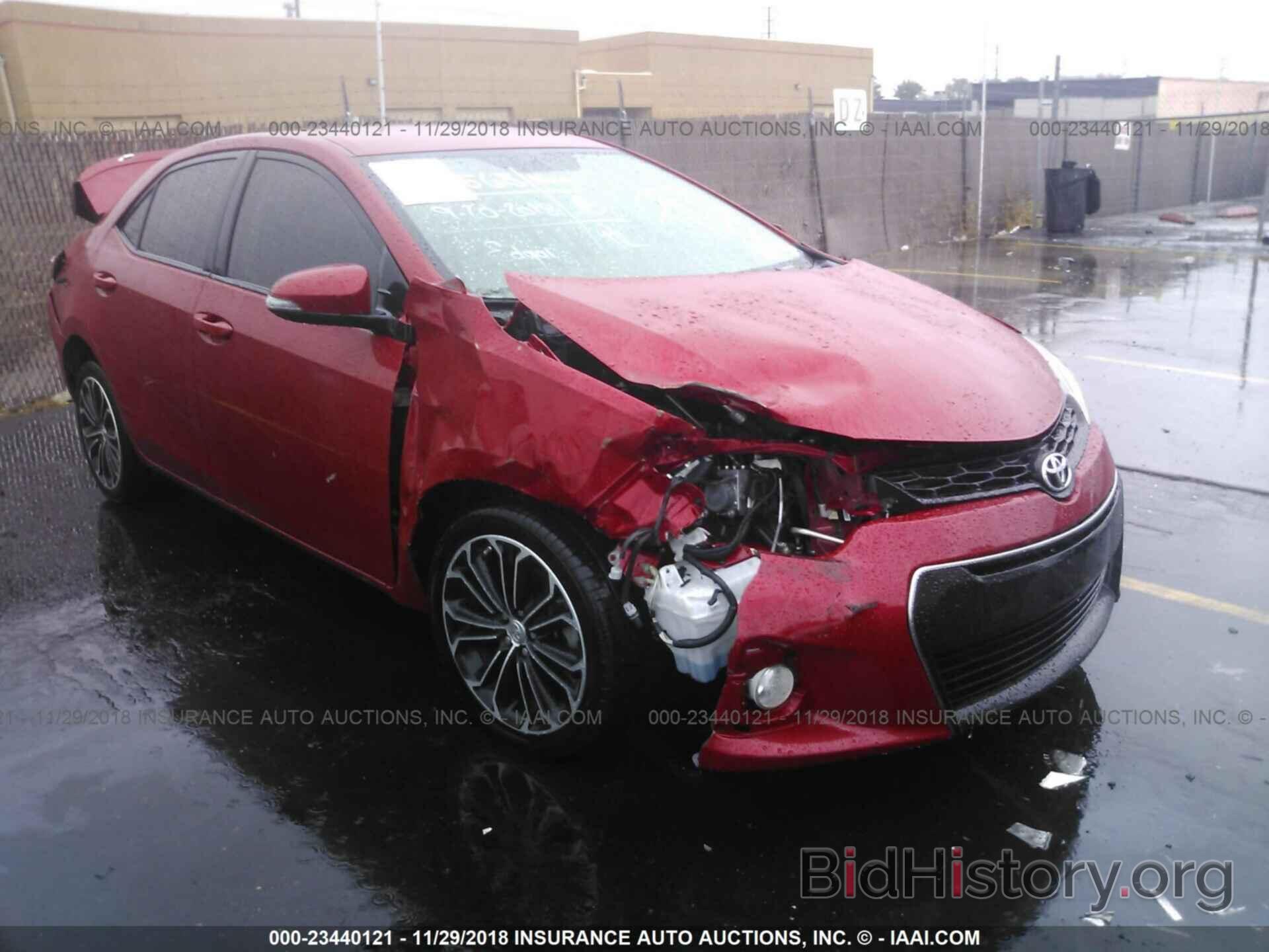 Photo 5YFBURHE7EP036833 - Toyota Corolla 2014